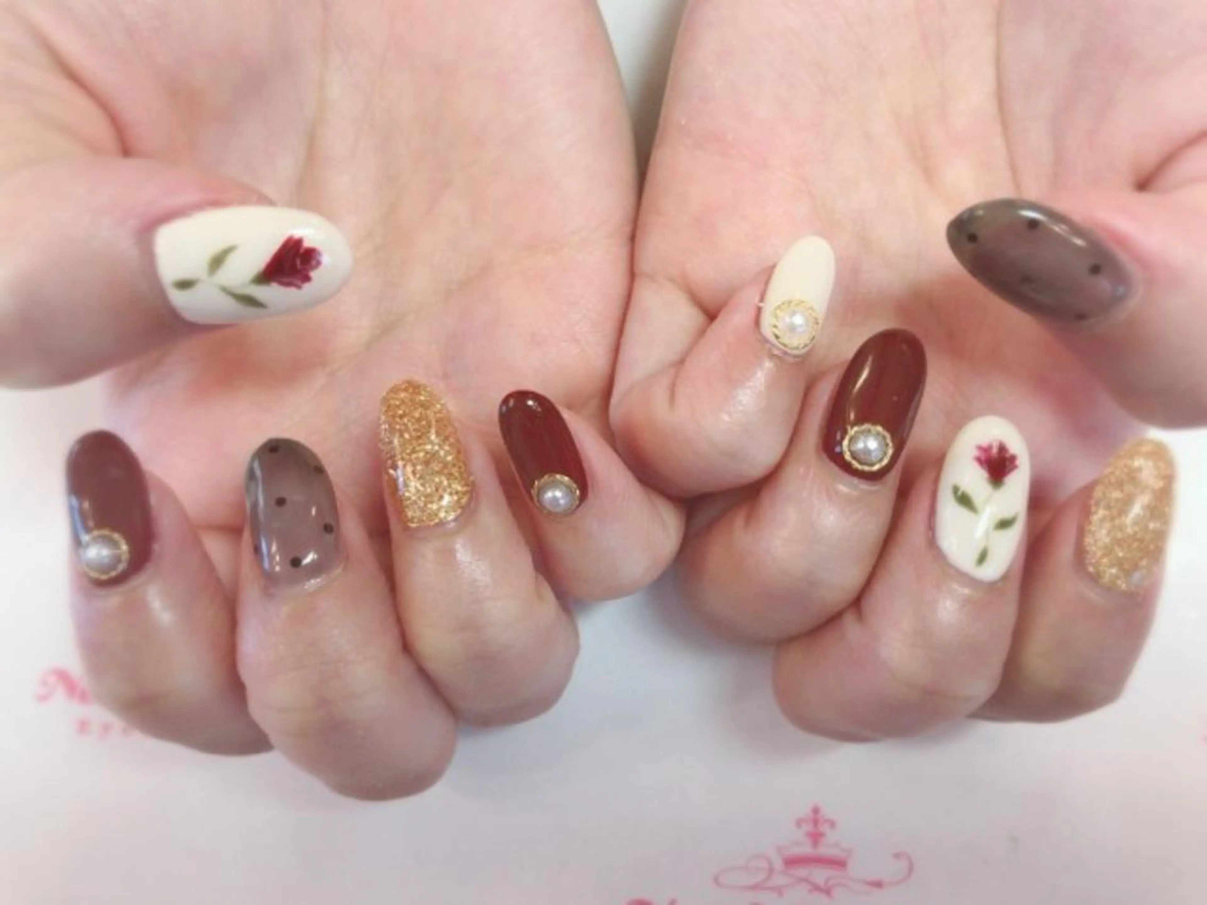 ネイル ネイルリボン 受付スタッフのネイルデザイン