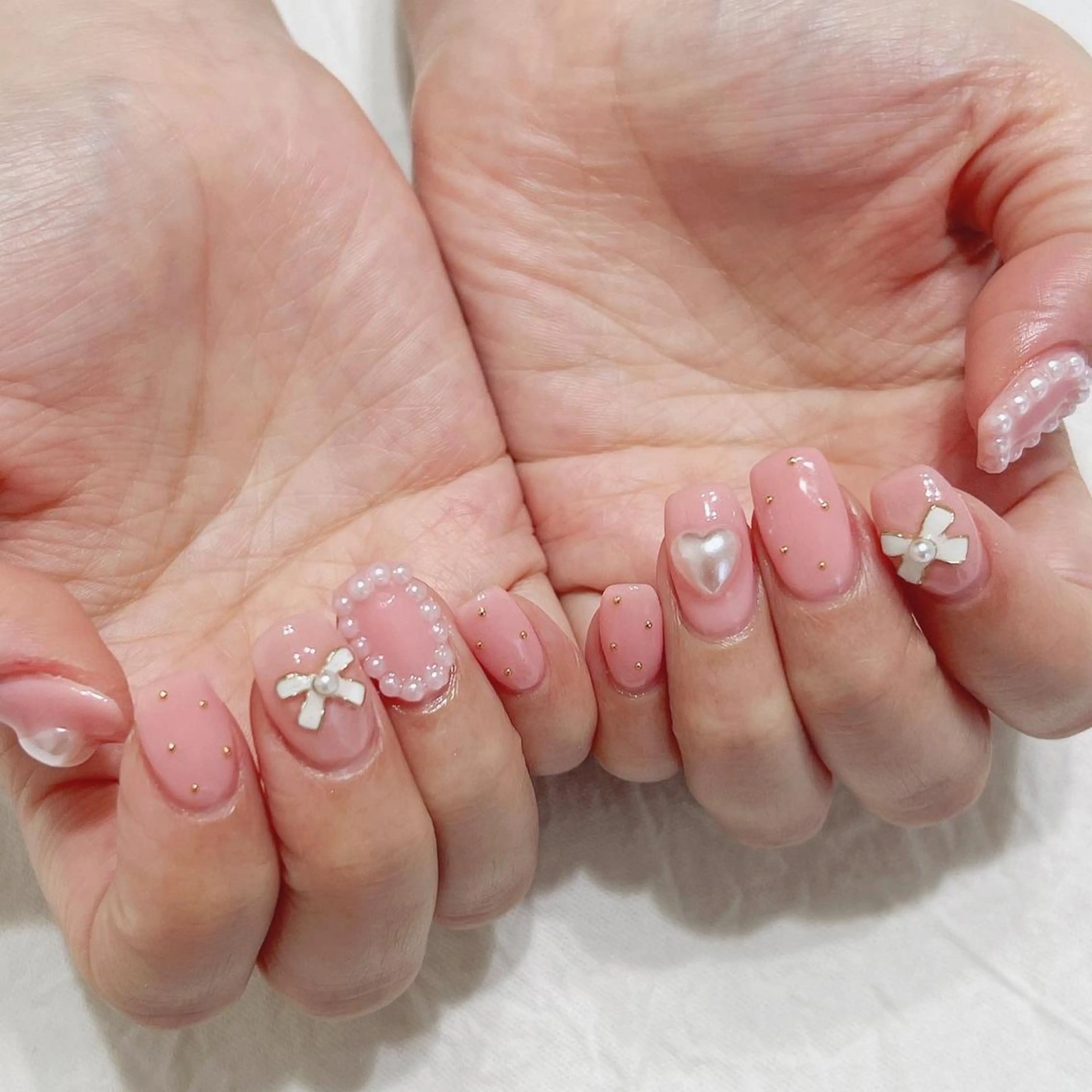 ネイル ハート ピンク リボン スクエアネイル ハンドネイル peaberry nailのネイルデザイン