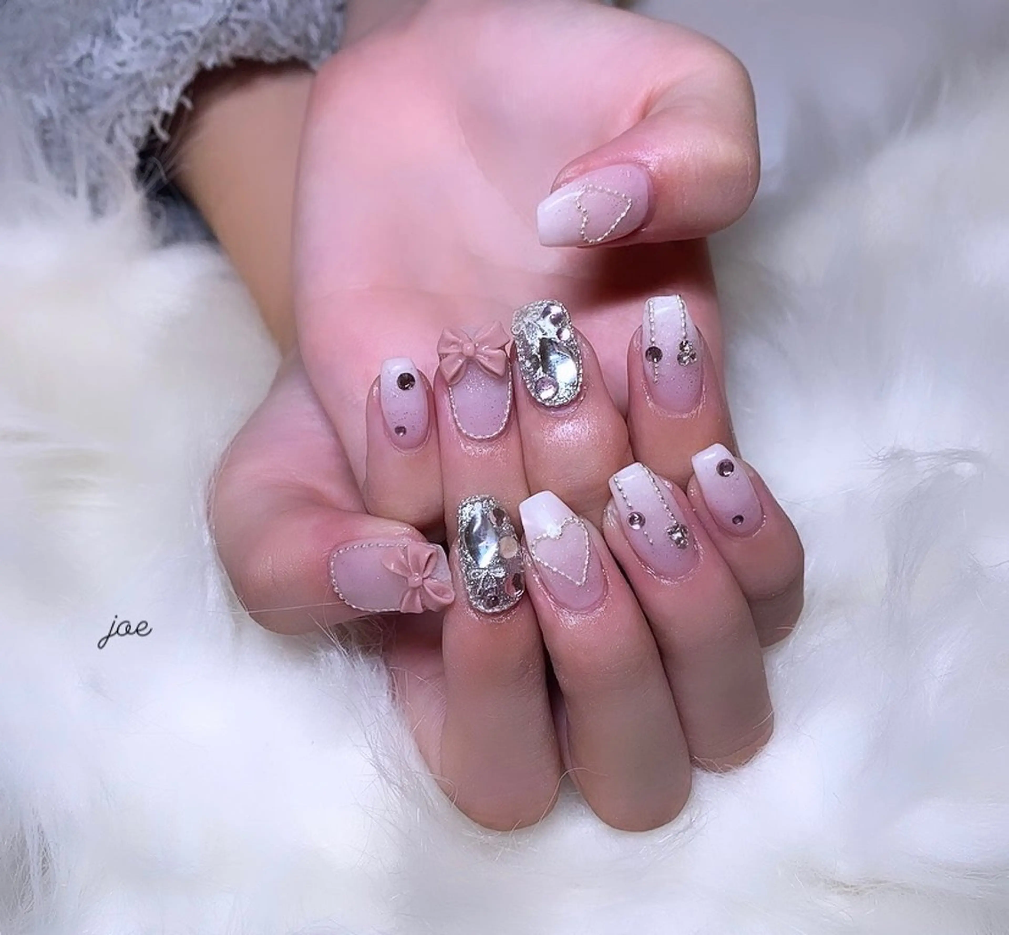 ネイル ハート リボン 石堂 さくらのネイルデザイン