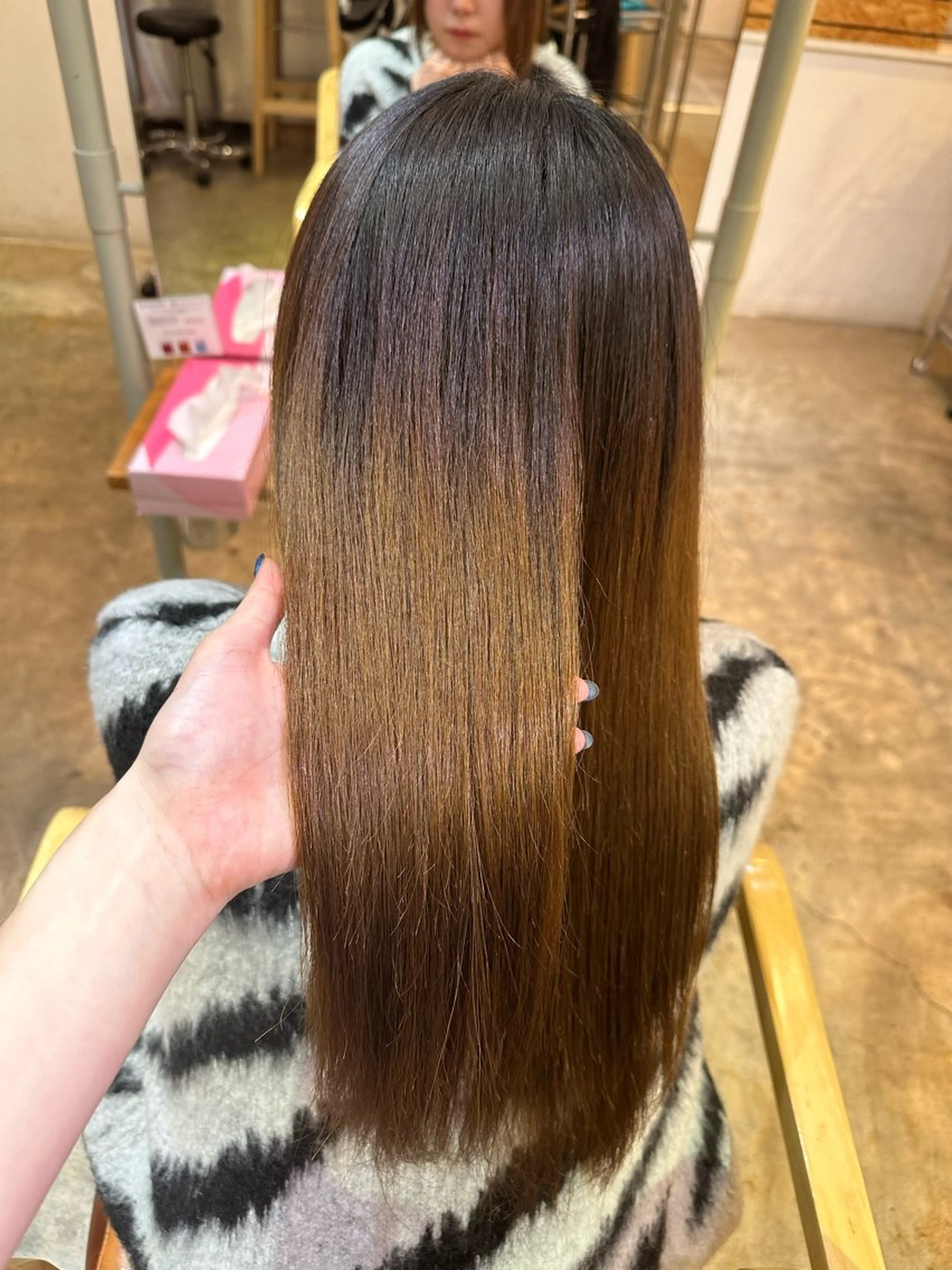 金 春江のヘアスタイル