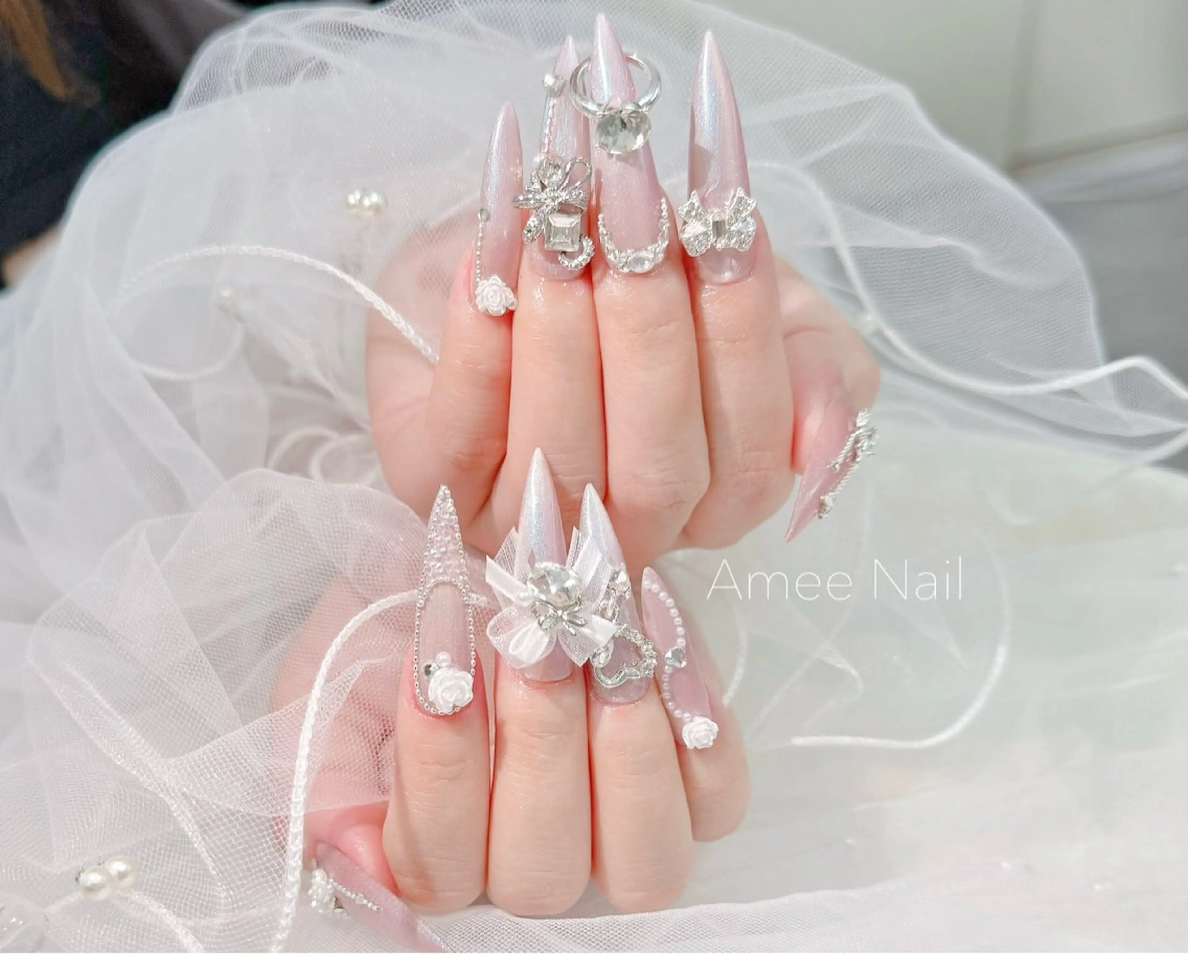 ネイル 成人式 ロングネイル マグネットネイル 大理石ネイル(マーブル) リボン ハンドネイル Amee Nail Salonのネイルデザイン