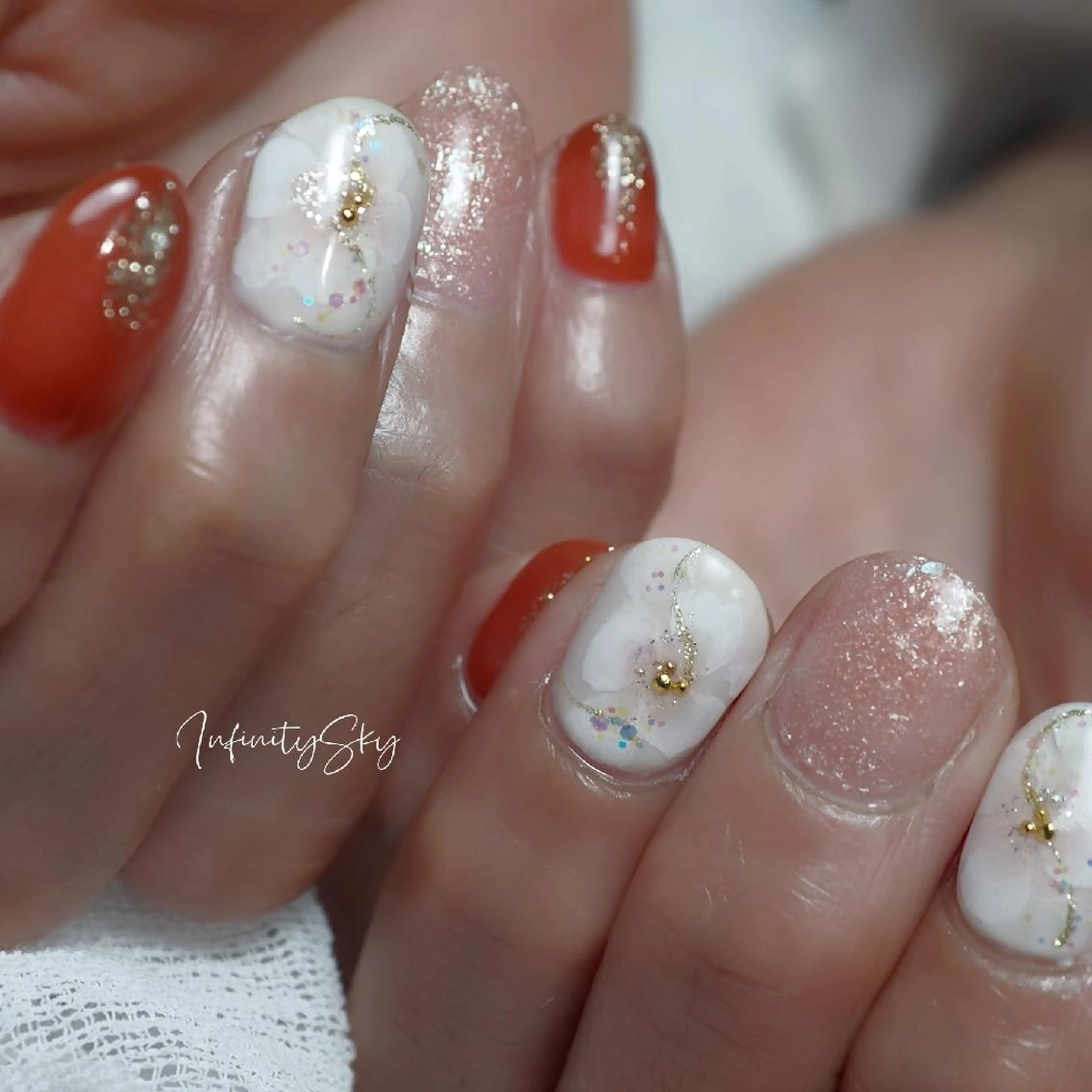 ネイル アートネイル フラワーネイル オレンジ infinity skyのネイルデザイン