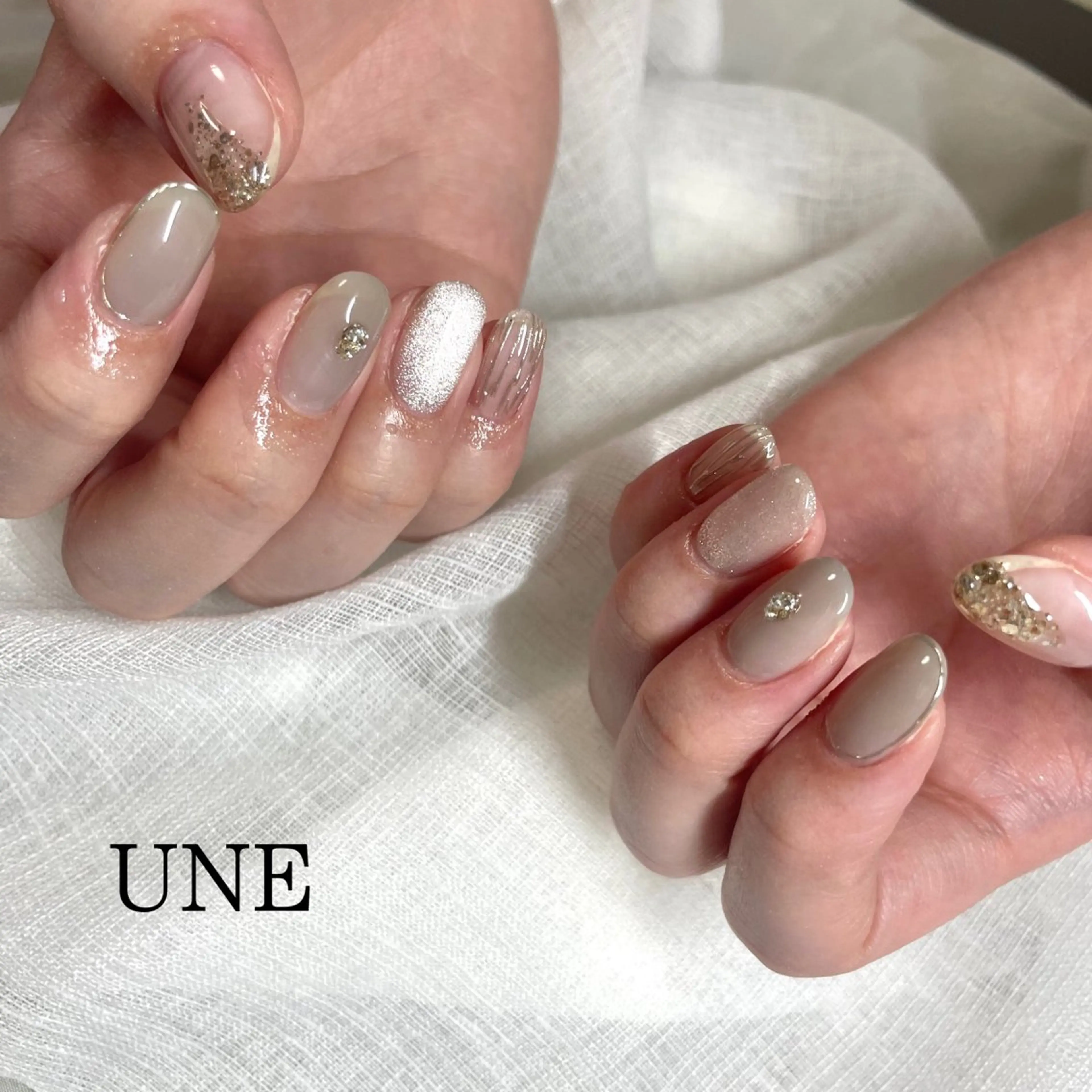 ネイル ニュアンスネイル シルバー シンプルネイル UNE.【ユヌ】 Jr.NANAのネイルデザイン