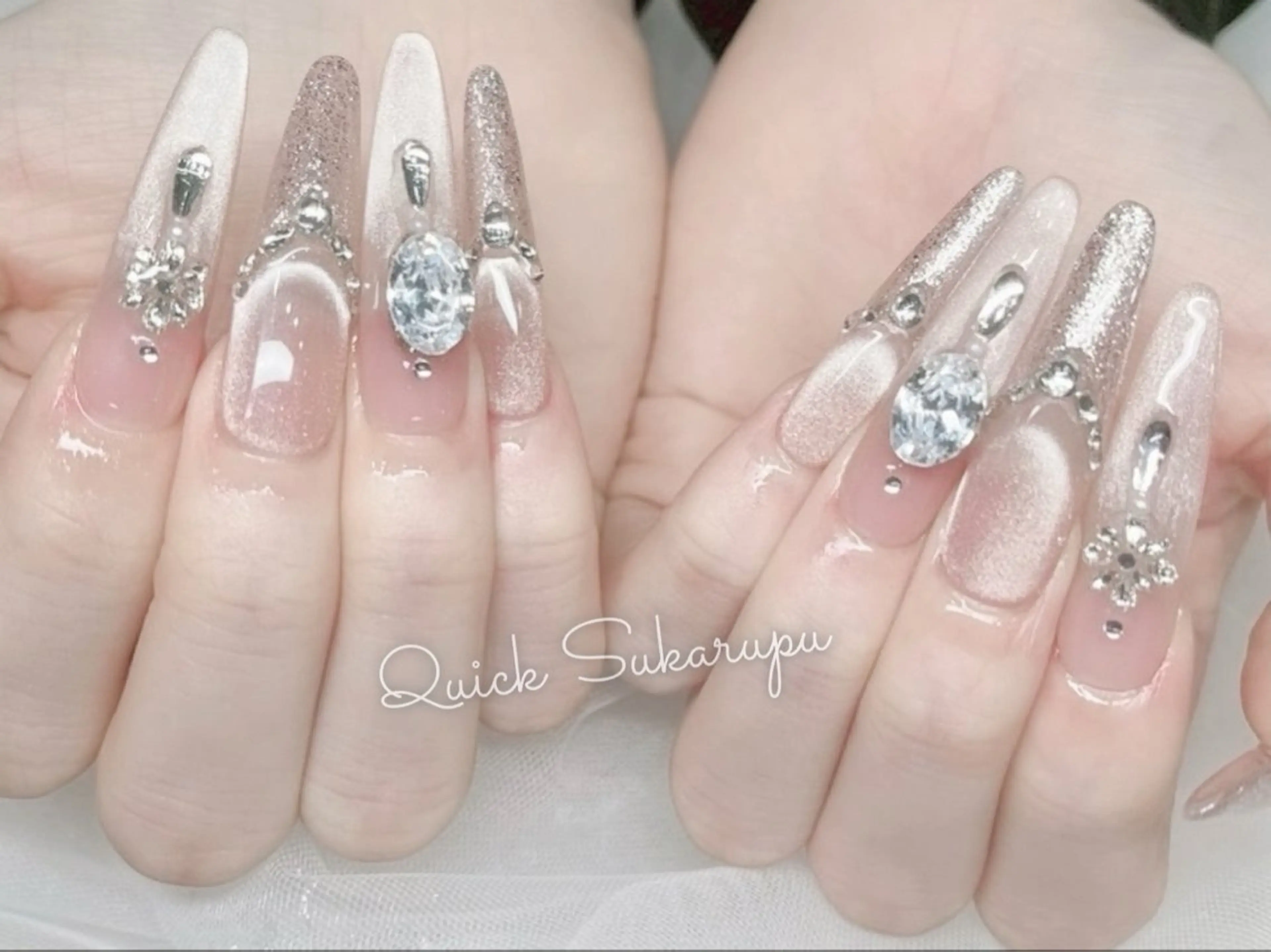 ロング ハンドネイル Quick Sukarupuのネイルデザイン