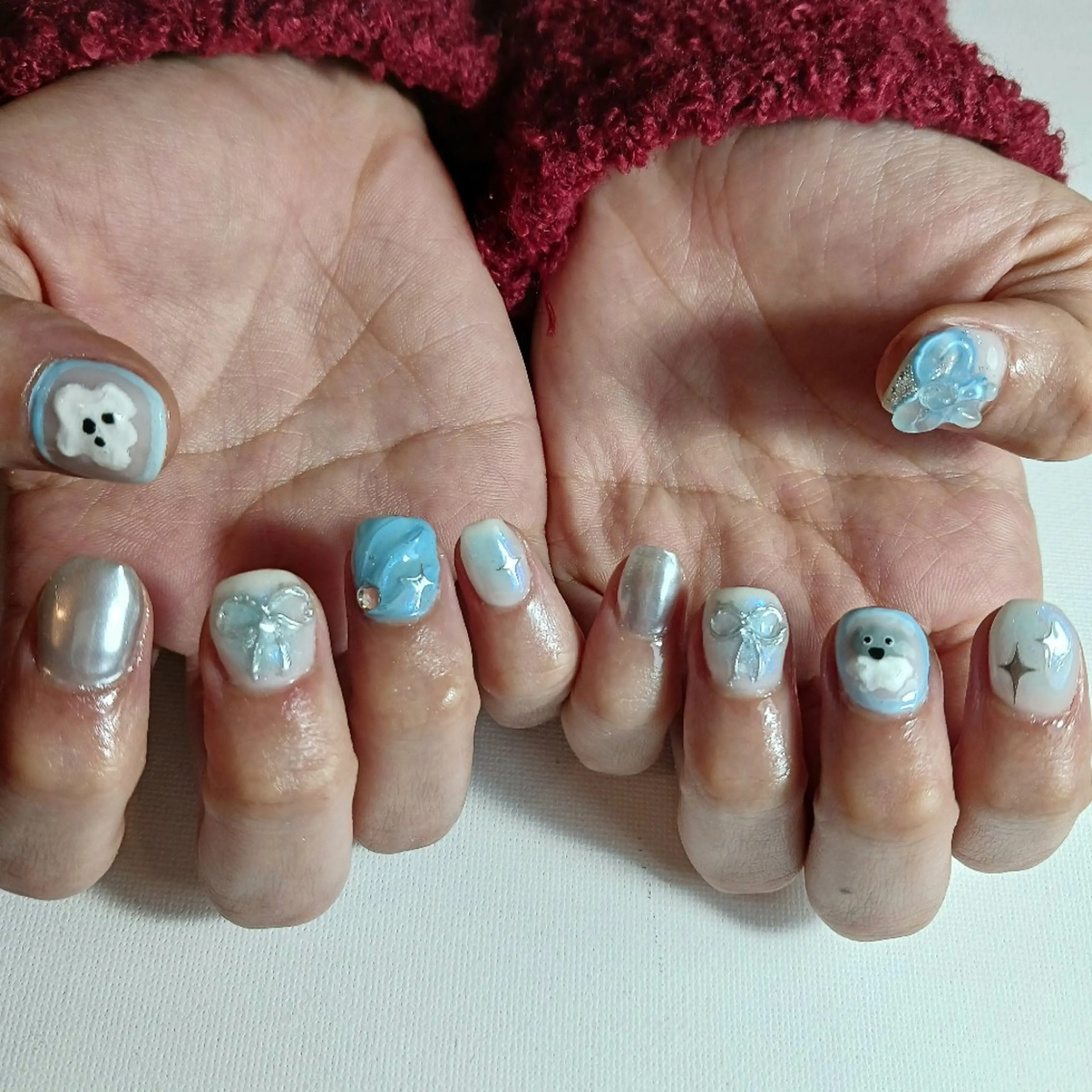 ネイル ジェルネイル 水色 ミラーネイル 持ち込み リボン ハンドネイル owlnail /持込みデザイン専門のネイルデザイン