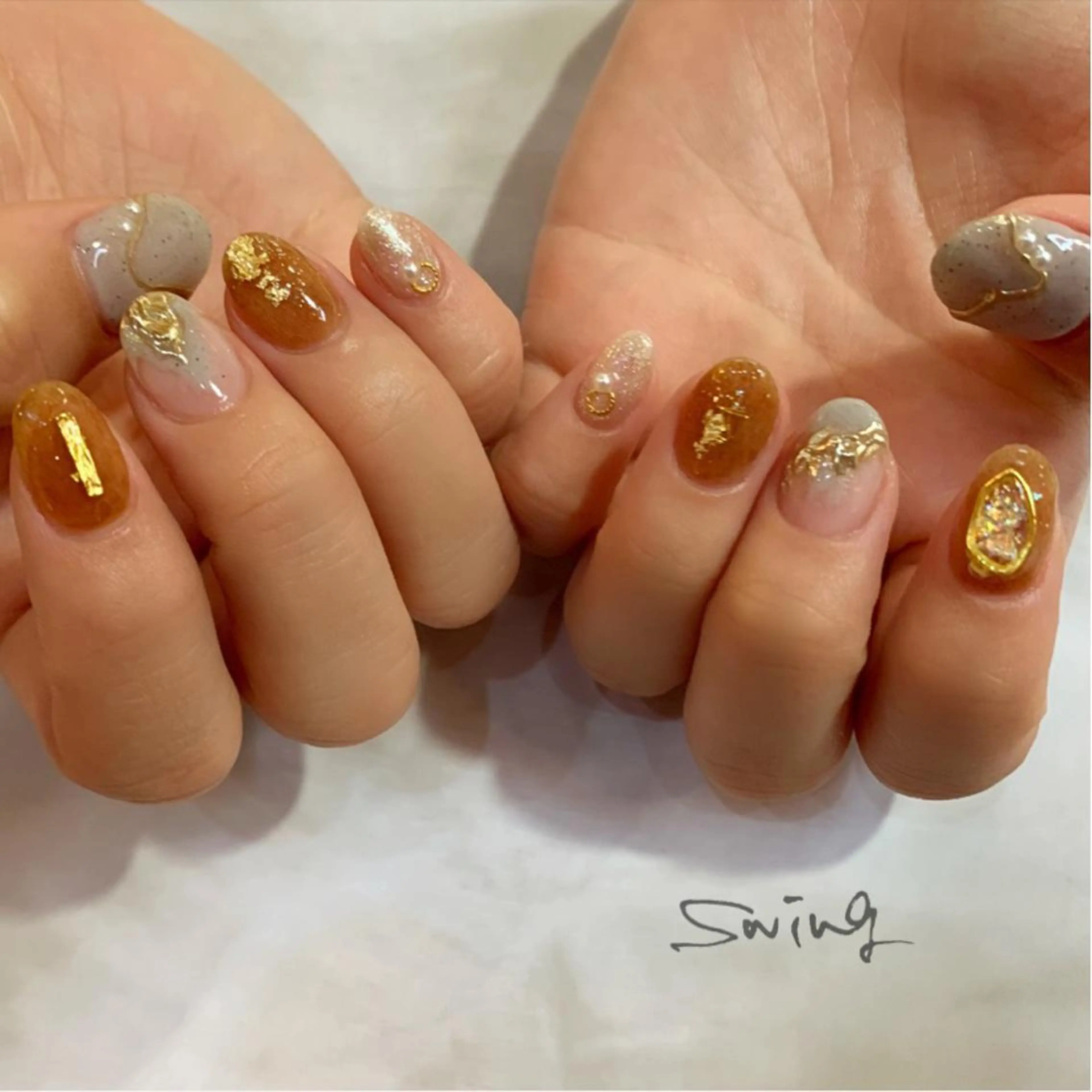 ネイル ブラウン ゴールド ミラーネイル ニュアンスネイル Yoshida Takakoのネイルデザイン