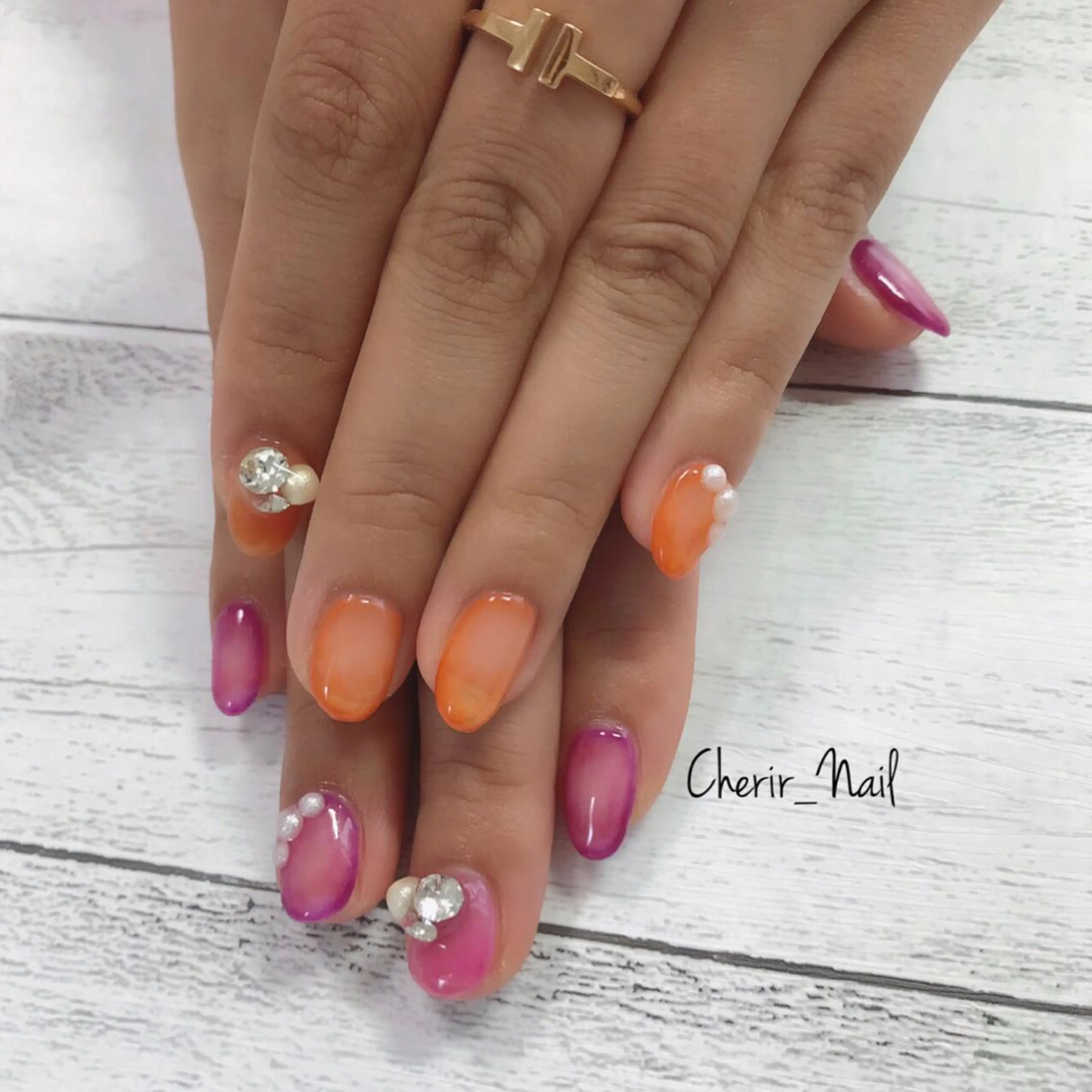 ネイル クリアネイル キラキラネイル オレンジ パープル Cherirnail kaoriのネイルデザイン