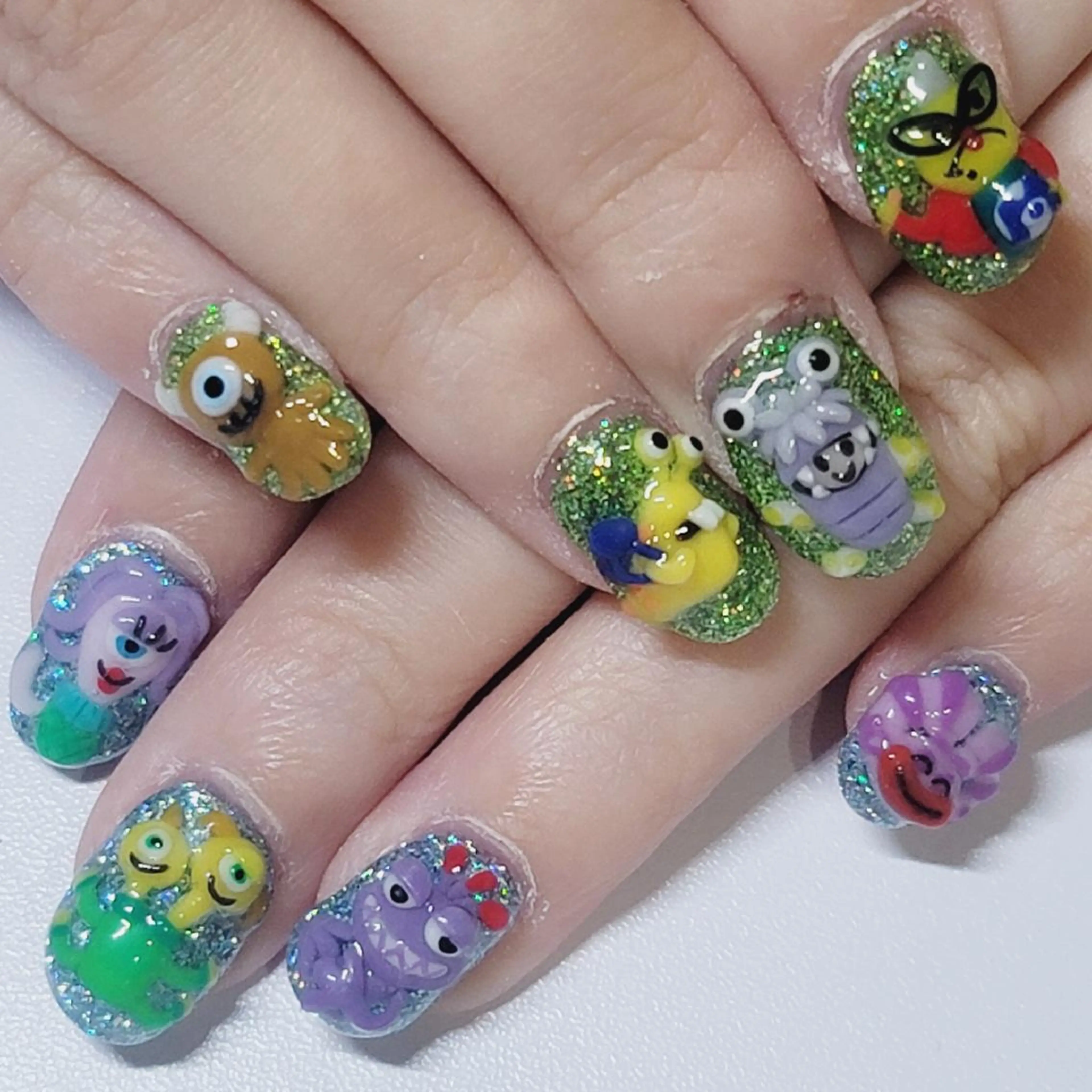 ネイル アートネイル オーロラネイル ブルー グリーン ラメ(グリッター) ハンドネイル よしだ ひろきのネイルデザイン