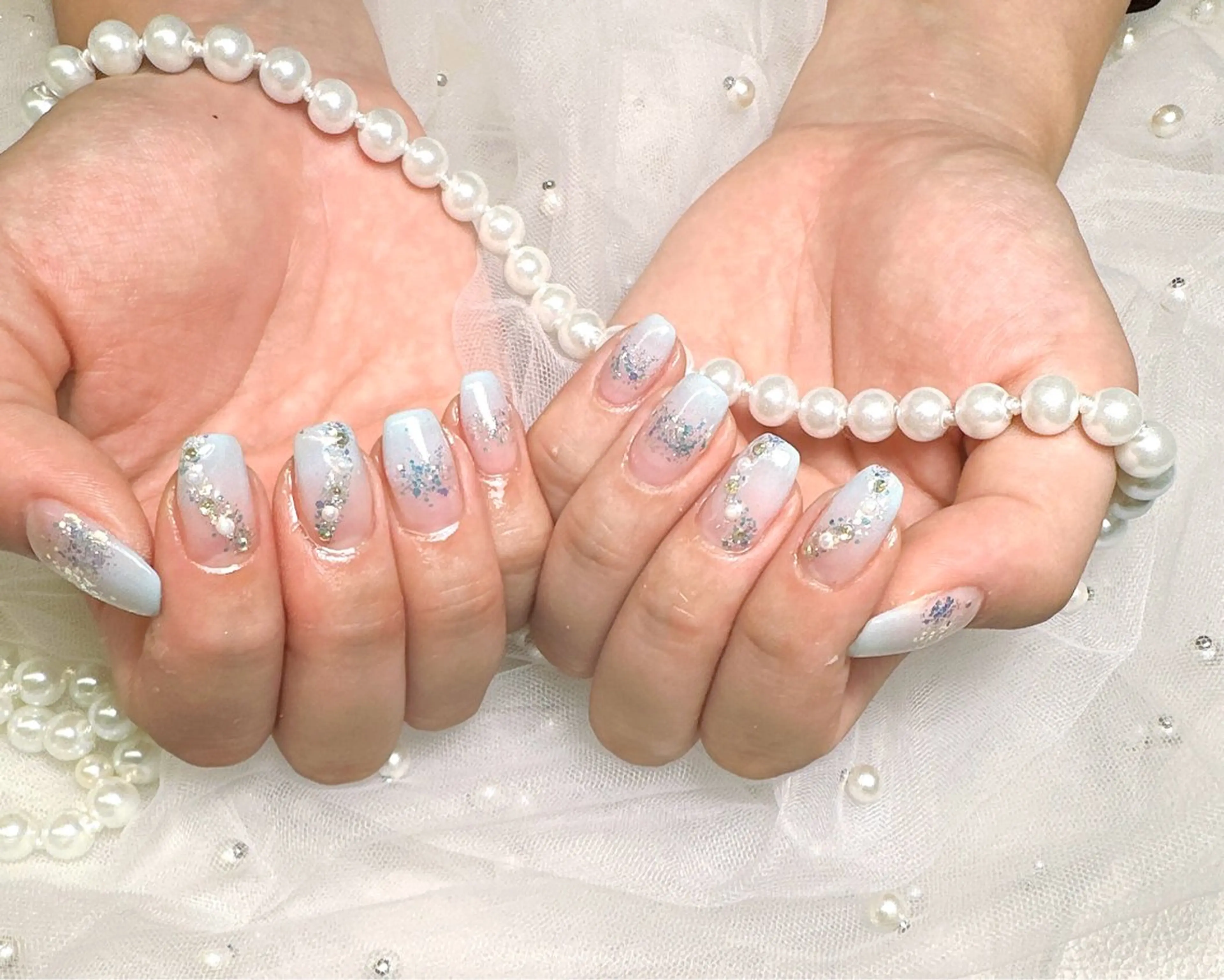 ネイル グラデーション キラキラネイル ラメ(グリッター) Pretty Nail Salonのネイルデザイン