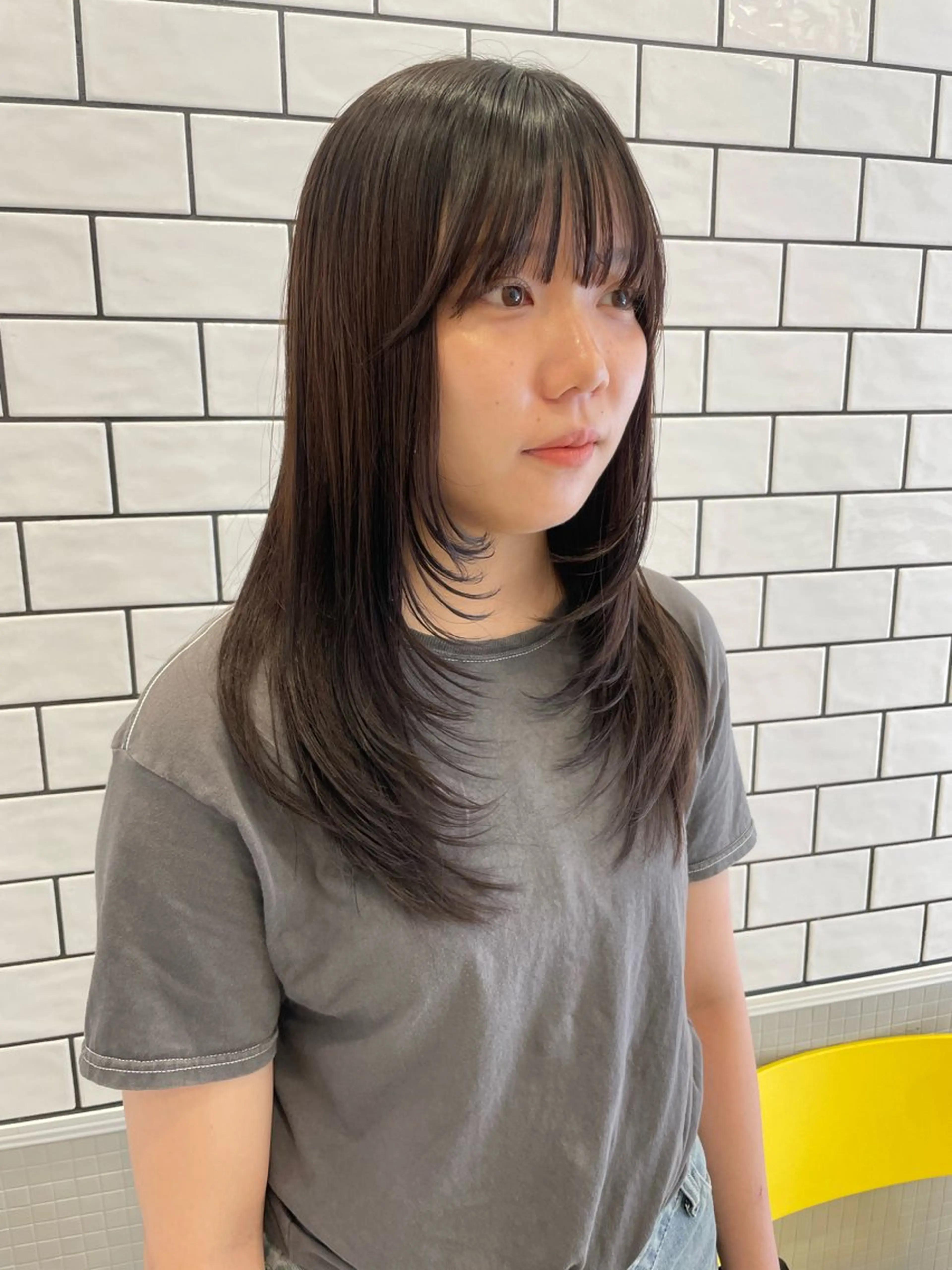 ロング MIFA レイヤー／パーマのヘアスタイル