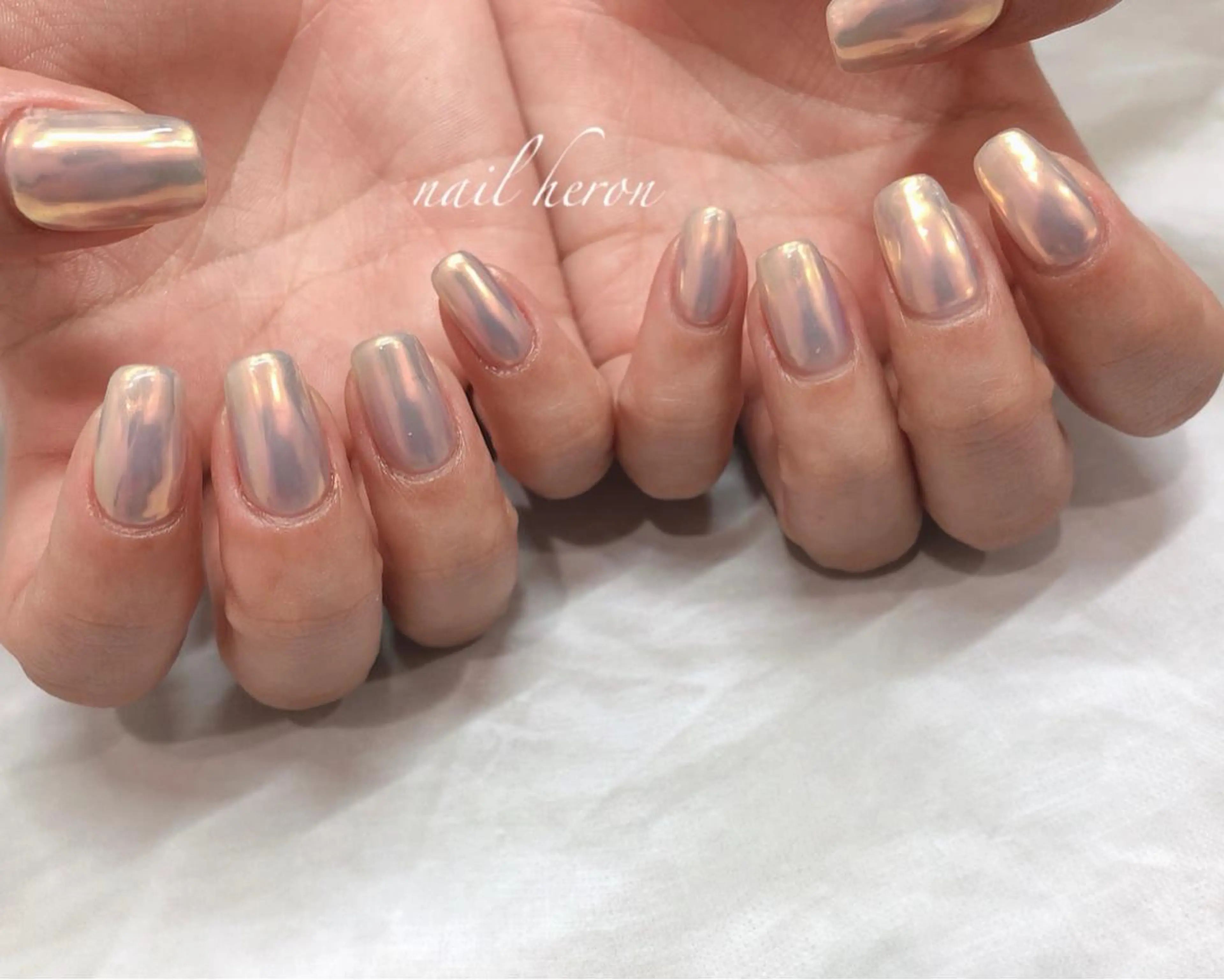 ネイル オーロラネイル オレンジ ホワイト ハンドネイル nail heron所属・saki_ nail heronのネイルデザイン