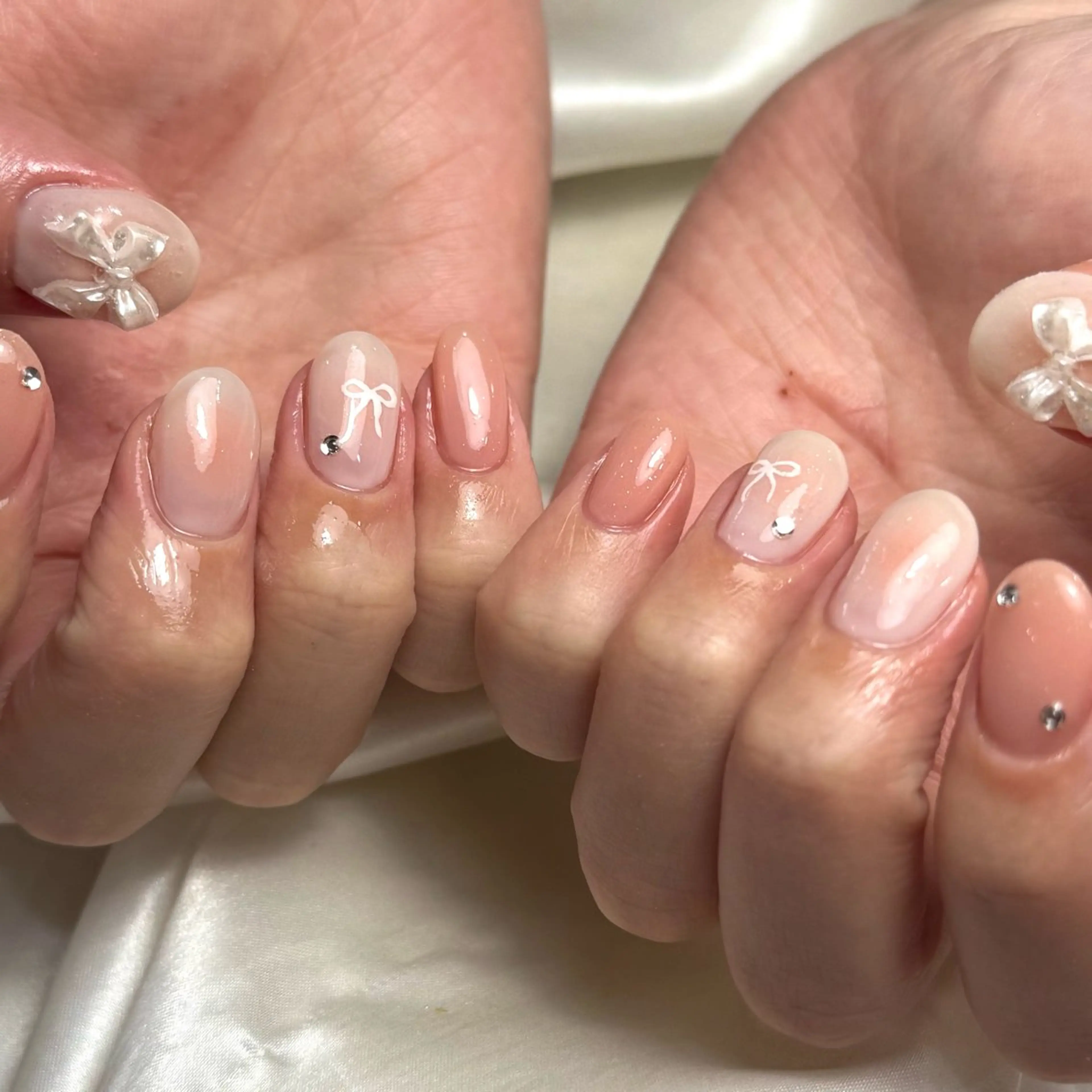 ネイル ガーリー ピンク リボン Ray nail natsu🎀のネイルデザイン