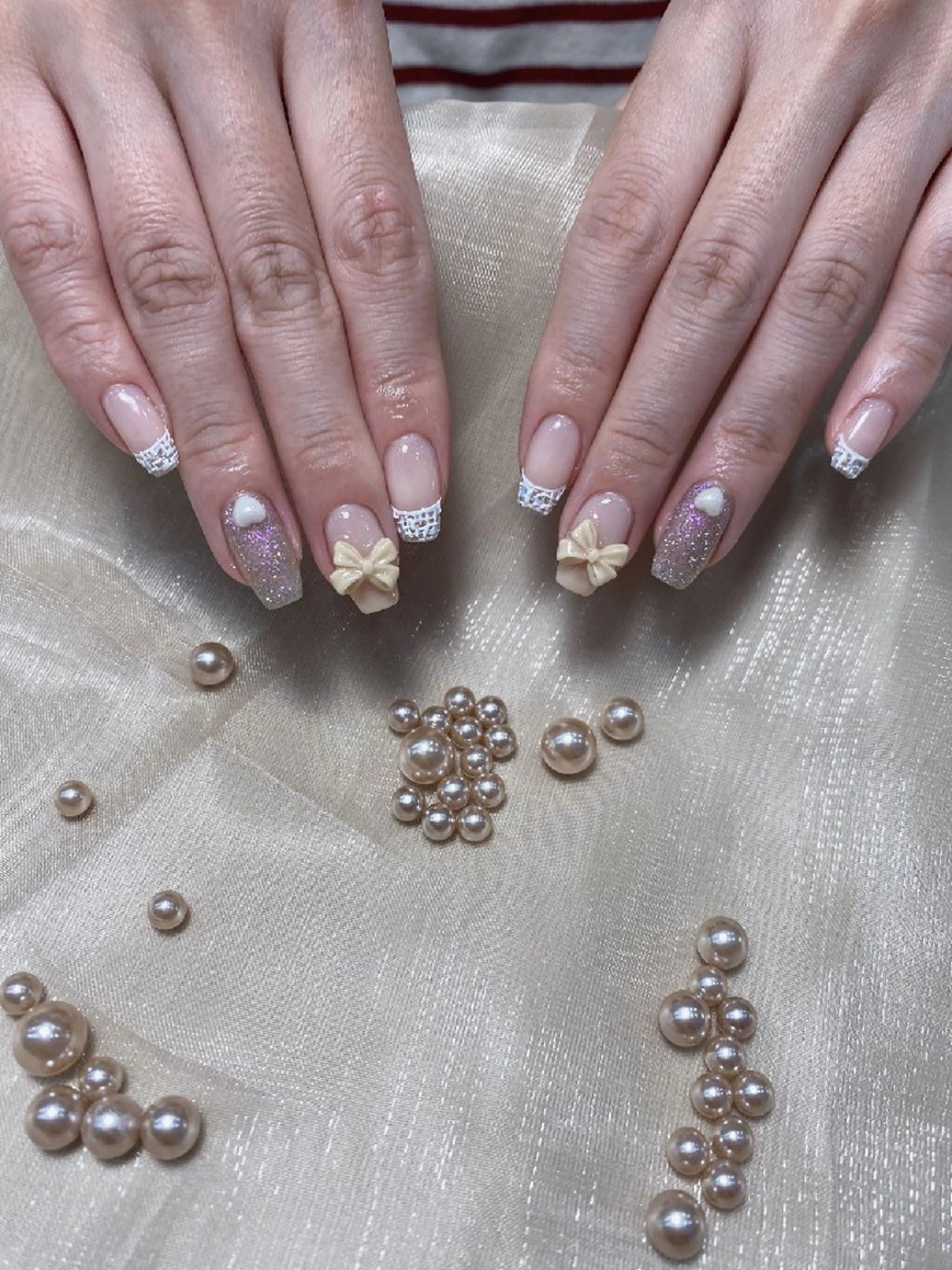 ネイル リボン ツイードネイル 冬ネイル ハンドネイル UM Nail Salonのネイルデザイン