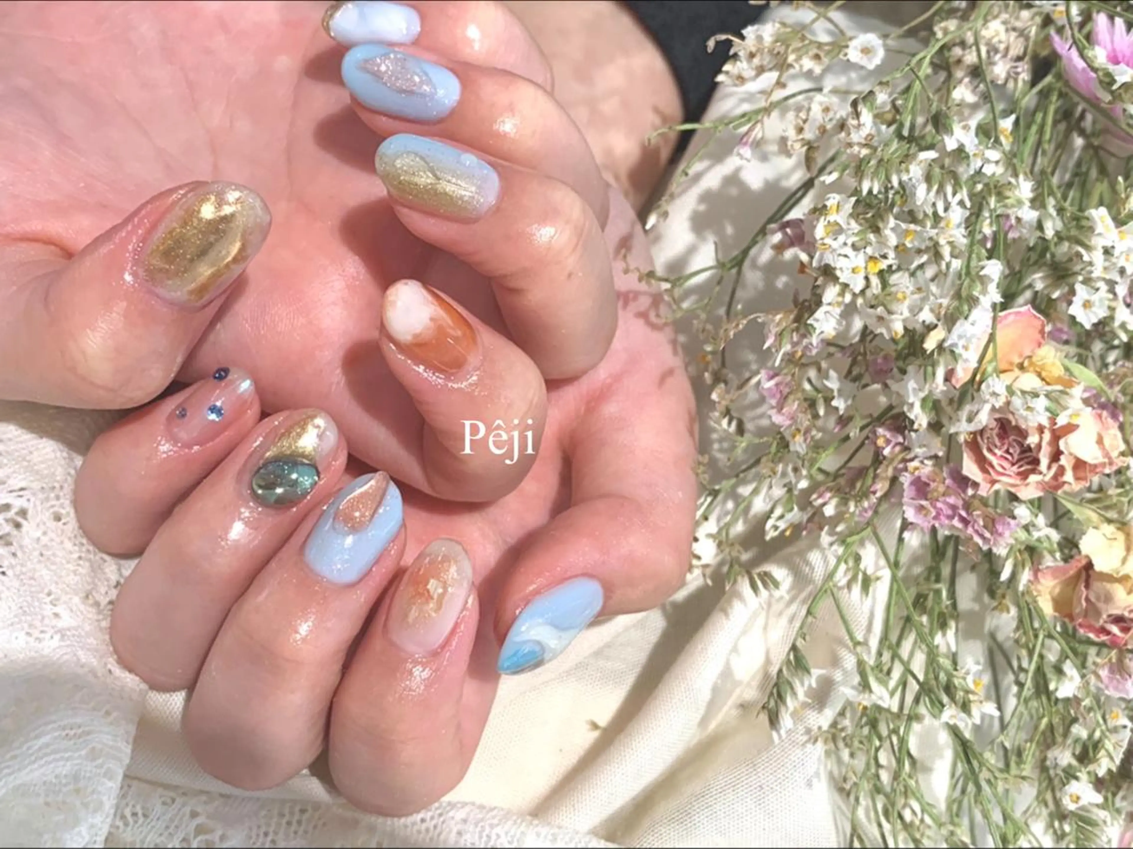 ミディアム m kaori𓃟のネイルデザイン