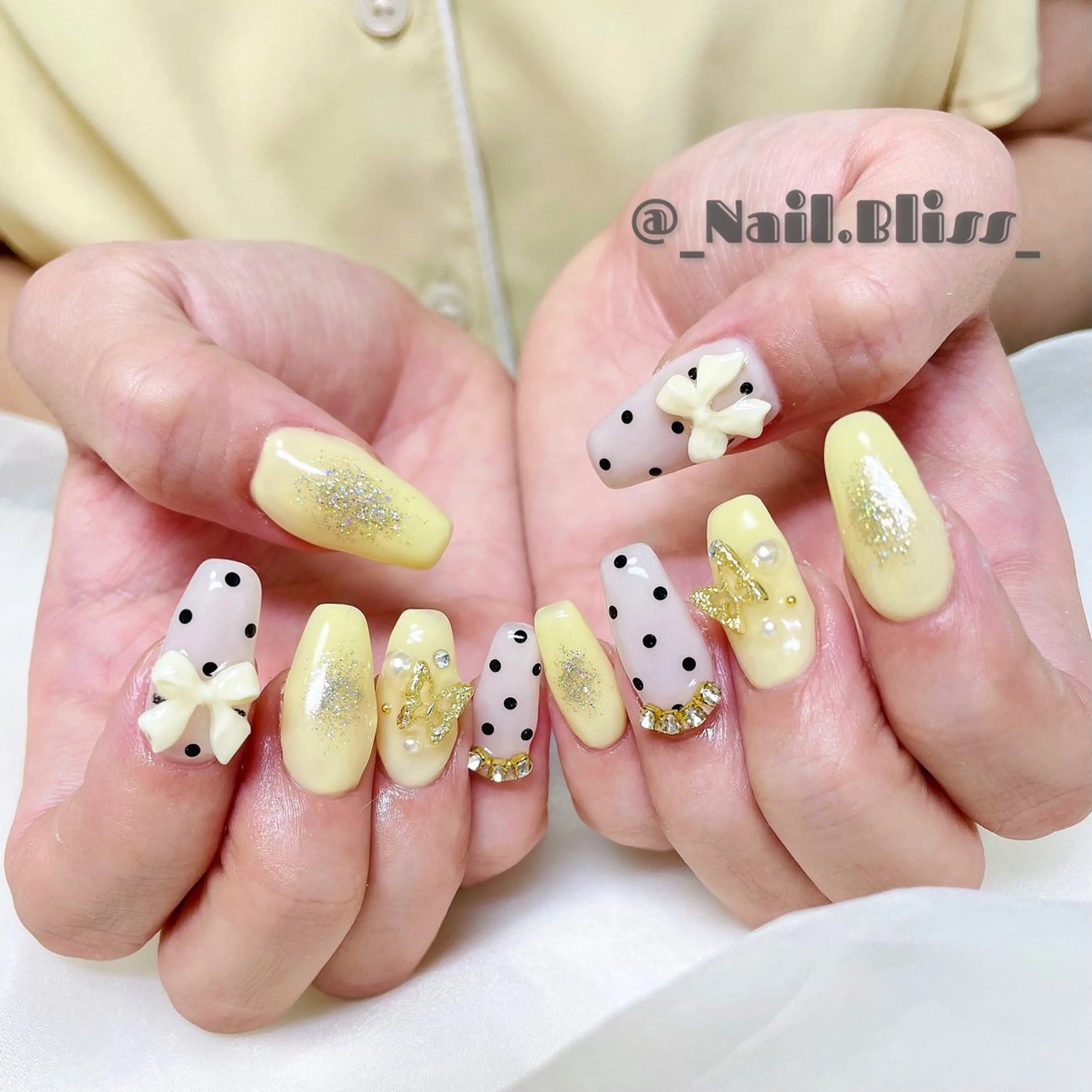 ネイル リボン 黄色 ハンドネイル NAIL BLISSのネイルデザイン