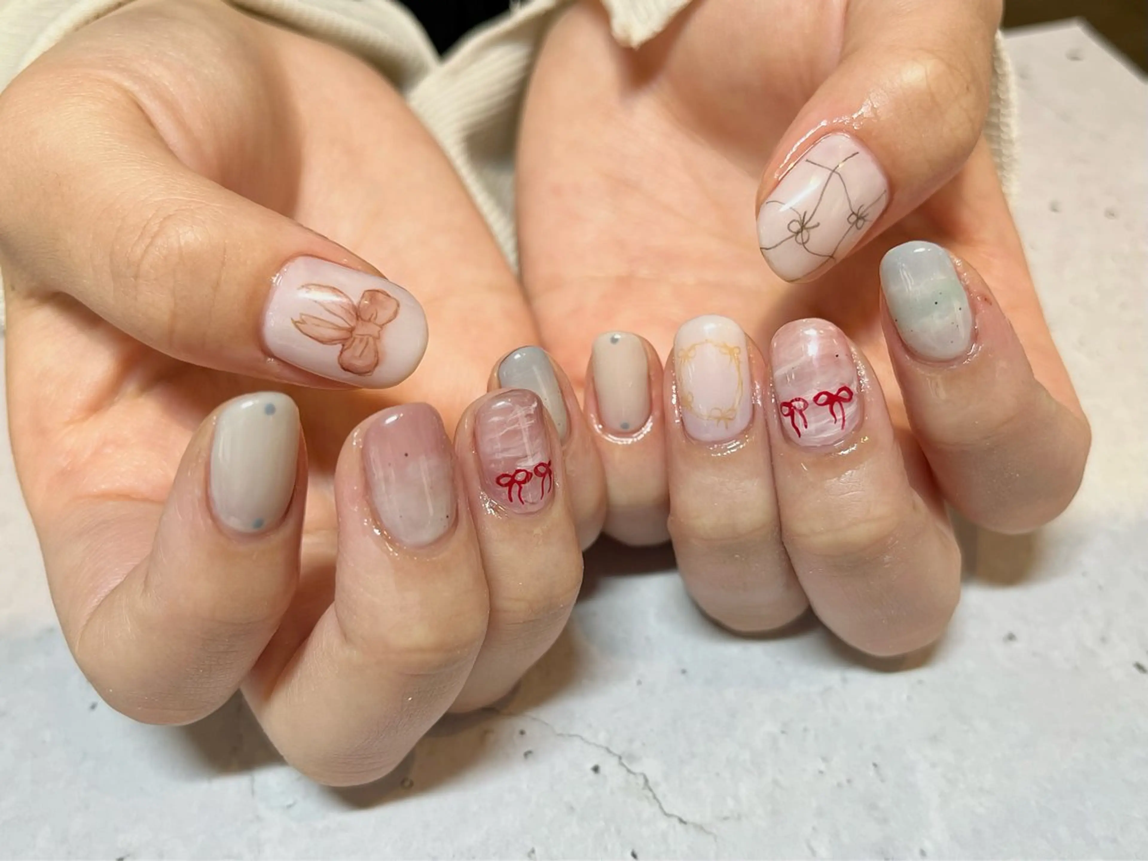 ネイル ニュアンスネイル リボン Nagashima sanaのネイルデザイン