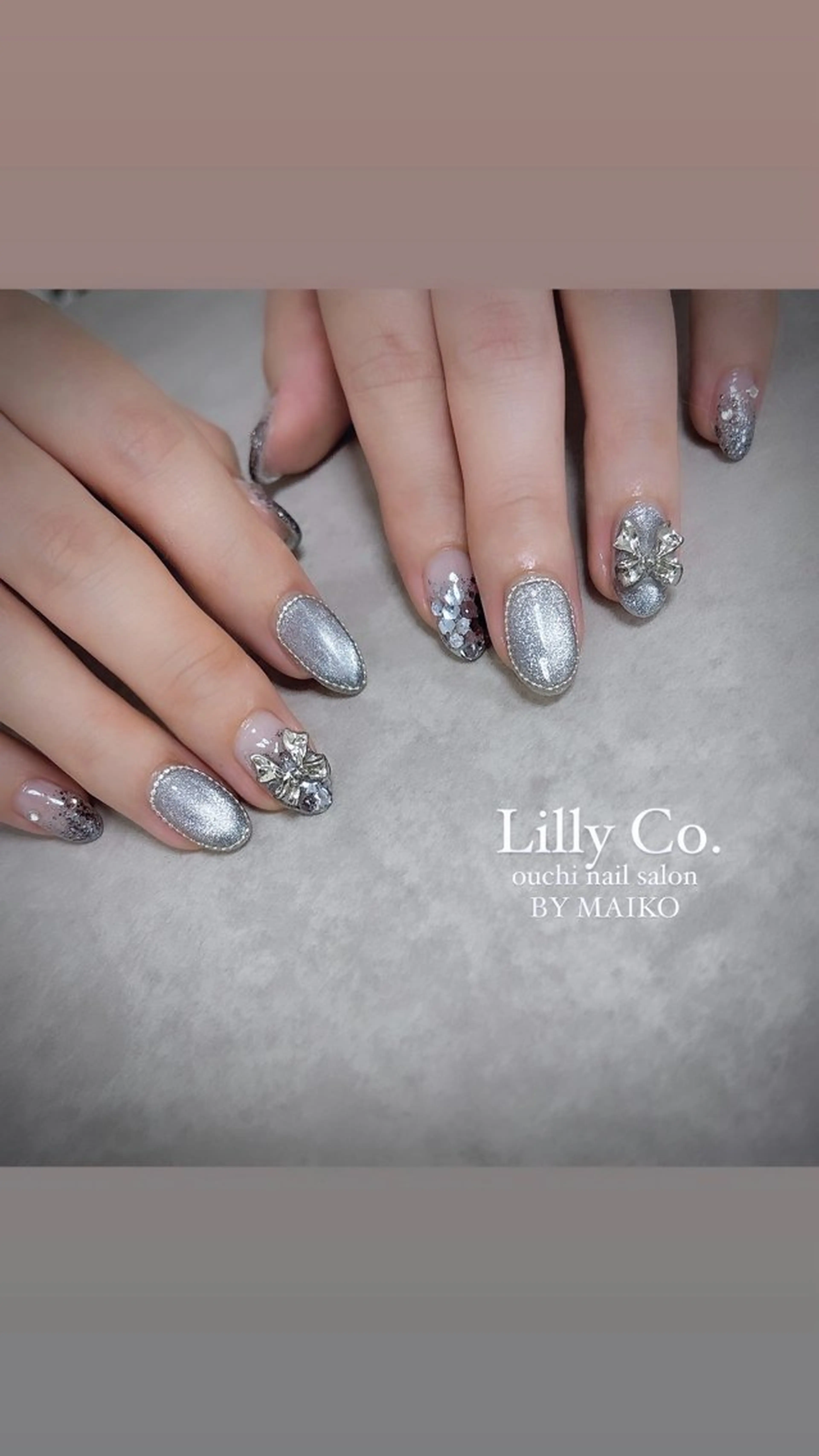 ネイル ブルー リボン ハンドネイル ハンドケア Lilly Co.のネイルデザイン