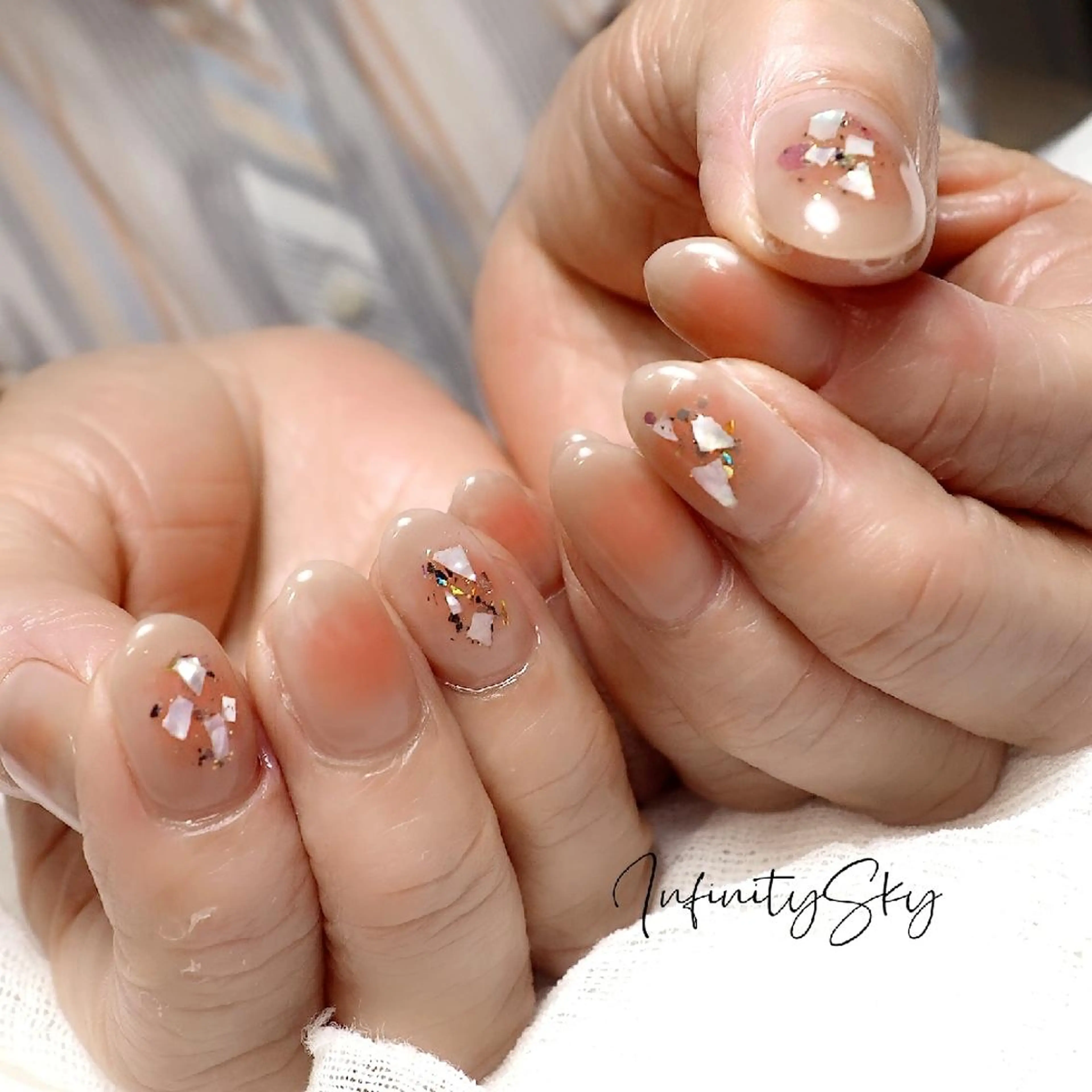 ネイル チークネイル infinity skyのネイルデザイン