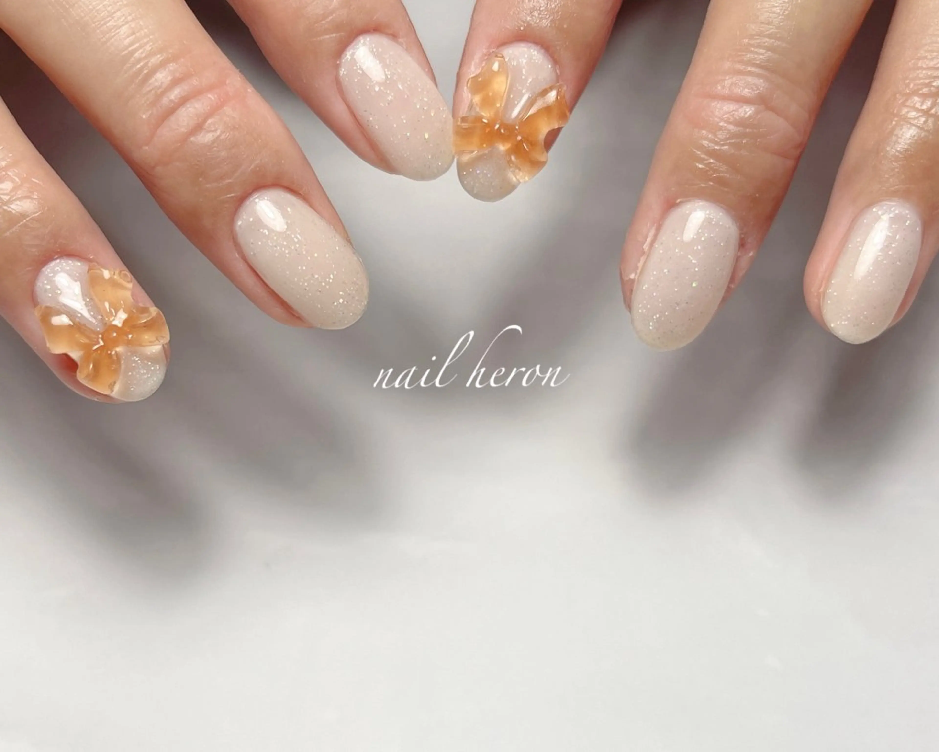 ネイル リボン saki_ nail heronのネイルデザイン