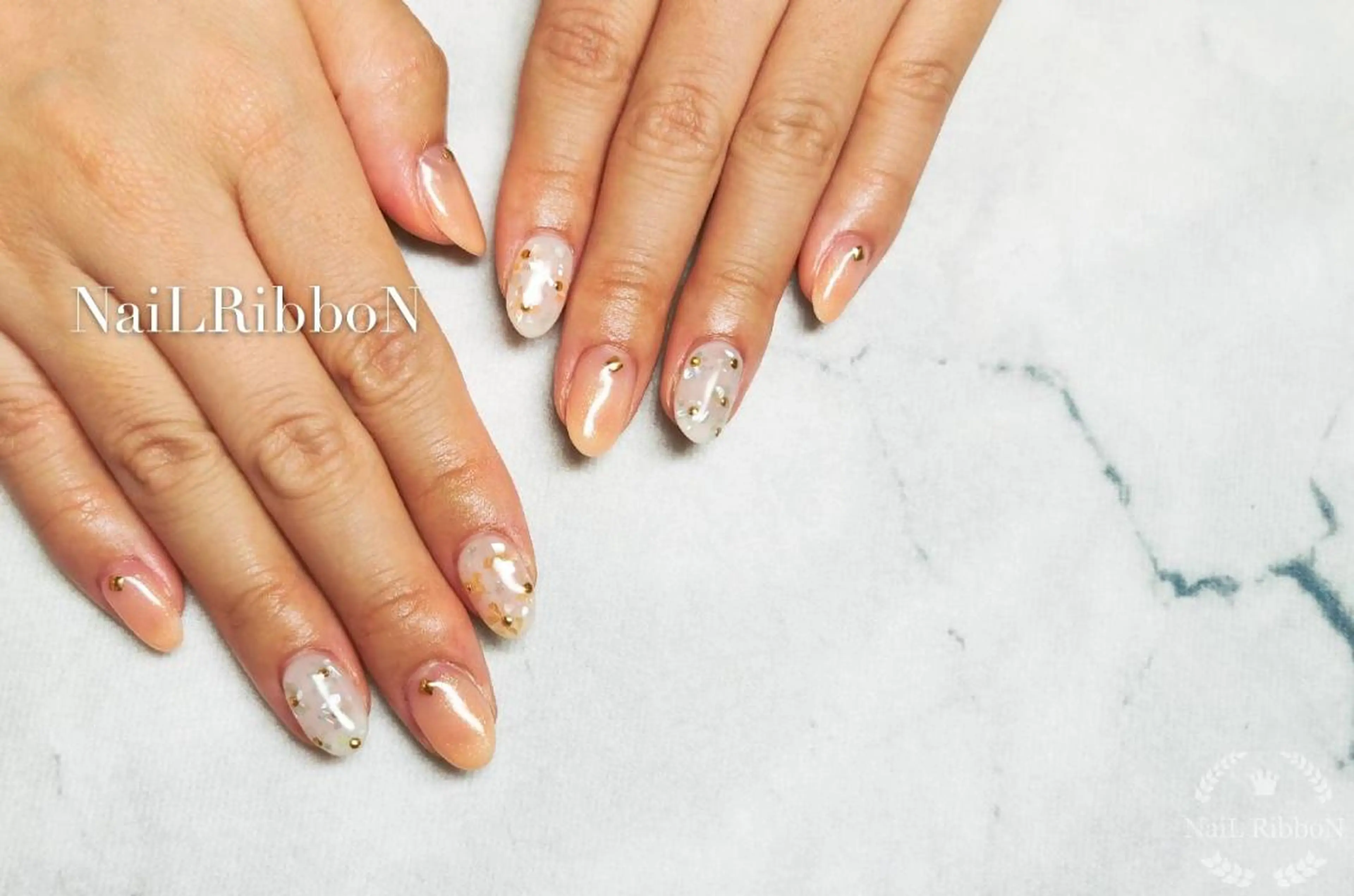 ネイル ネイルリボン 受付スタッフのネイルデザイン