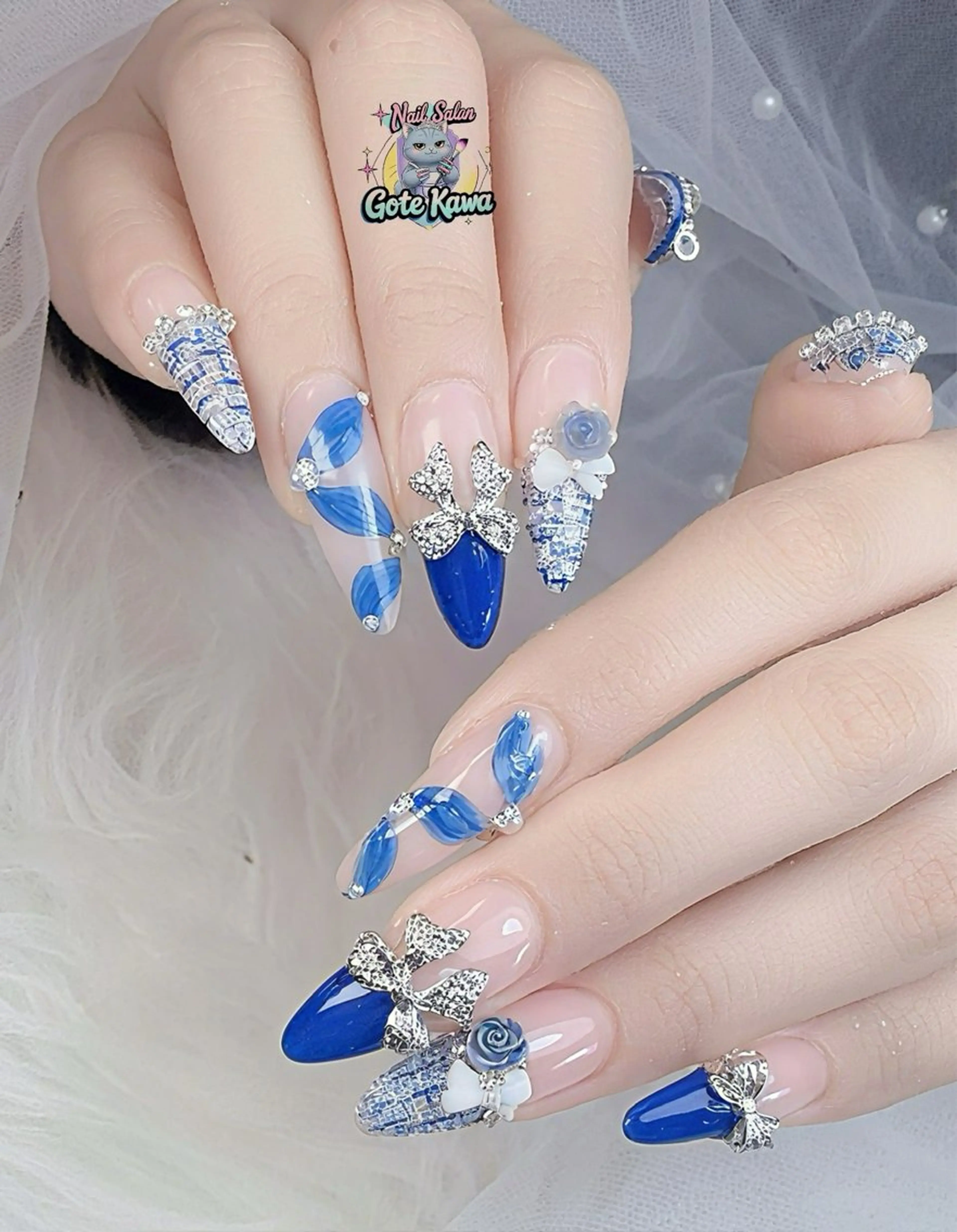 ネイル アートネイル 長さ出し キラキラネイル ピンク リボン ハンドネイル ハンドケア Gote Kawa nail salonのネイルデザイン