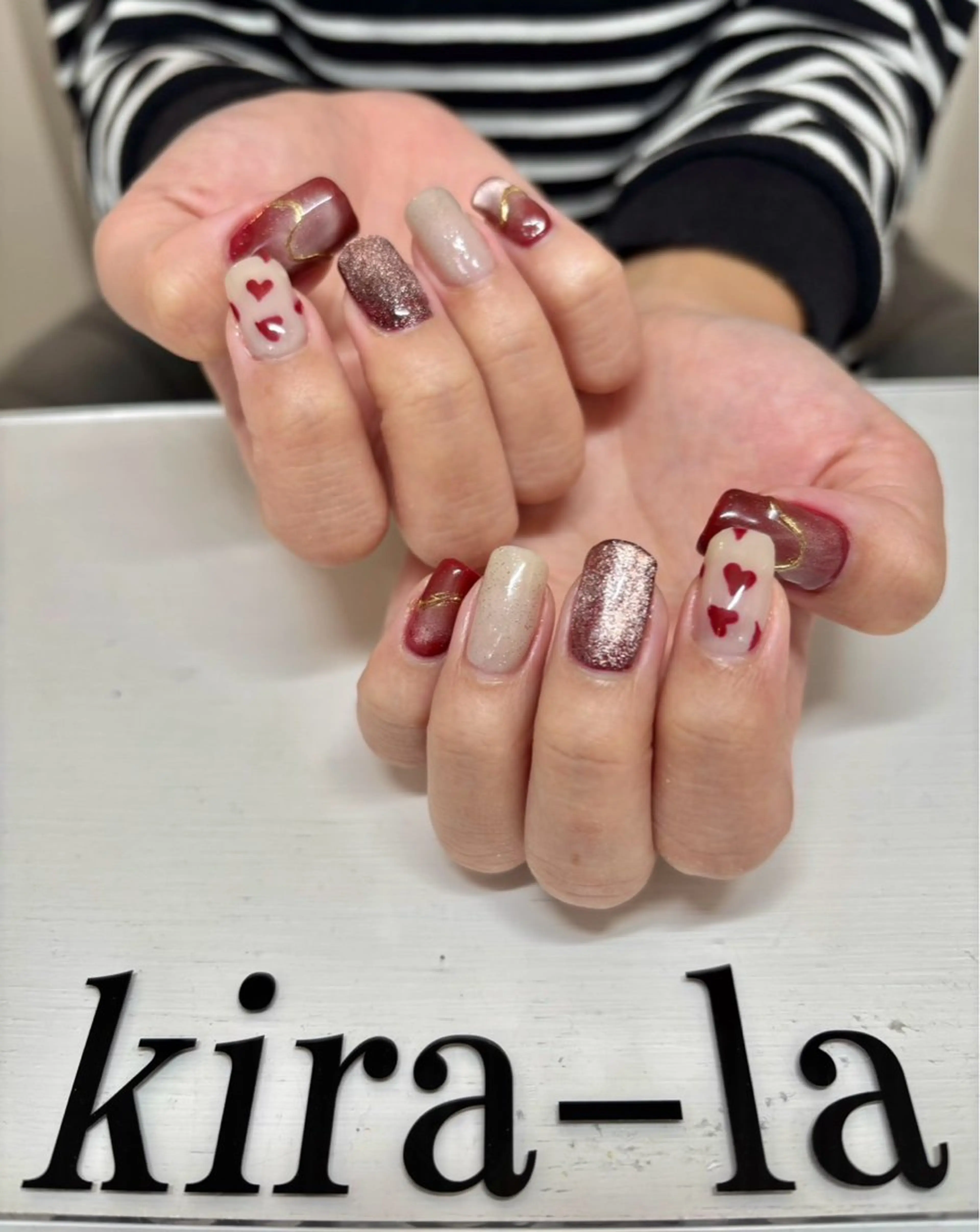 ネイル アートネイル ハート マグネットネイル ミラーネイル 赤色 kira-la キララ･:*..のネイルデザイン