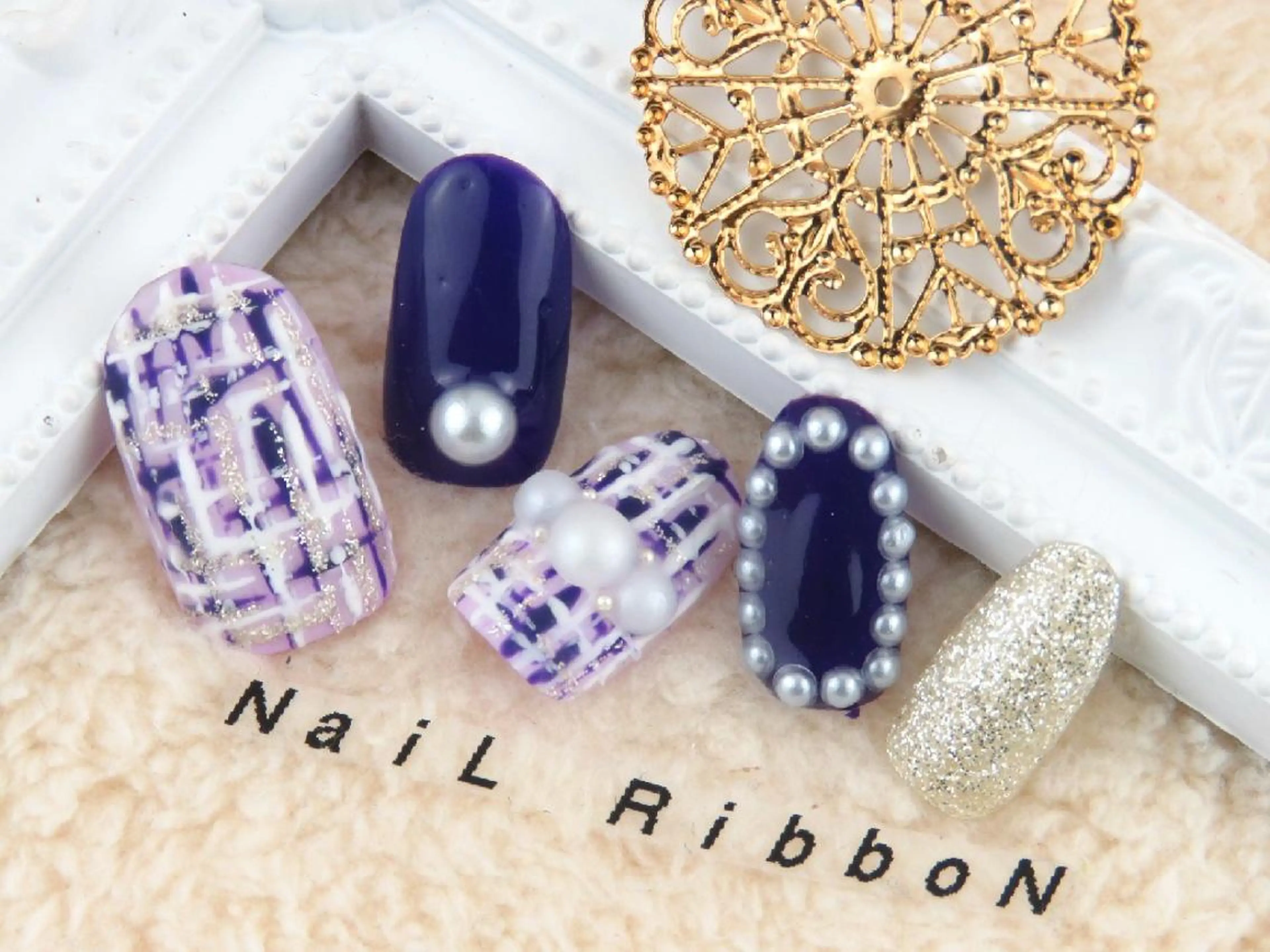 ネイル ネイルリボン 受付スタッフのネイルデザイン