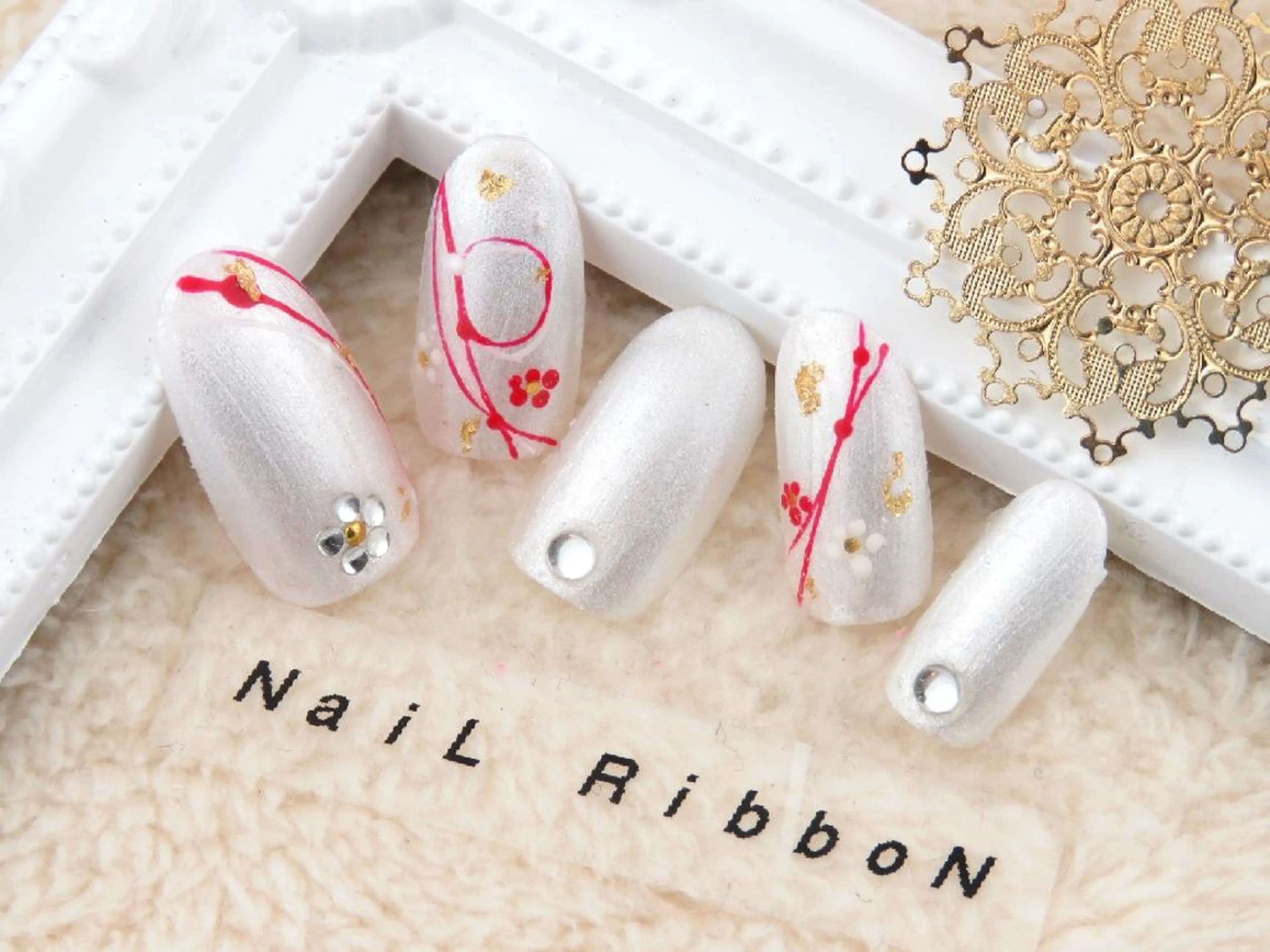 ネイル ネイルリボン 受付スタッフのネイルデザイン