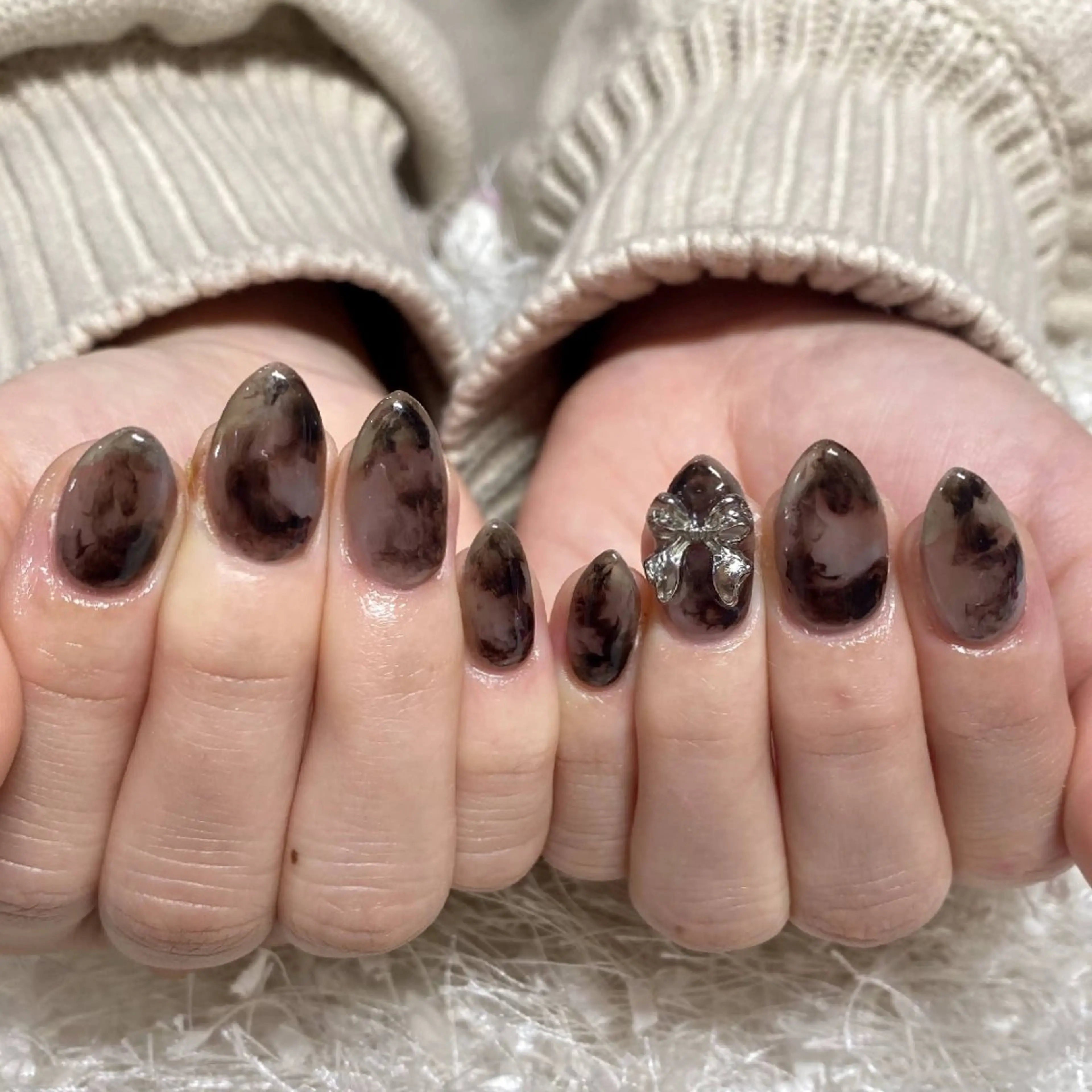 ネイル 韓国ネイル 大理石ネイル(マーブル) ニュアンスネイル リボン 冬ネイル BelireMaa Nail&eyeのネイルデザイン