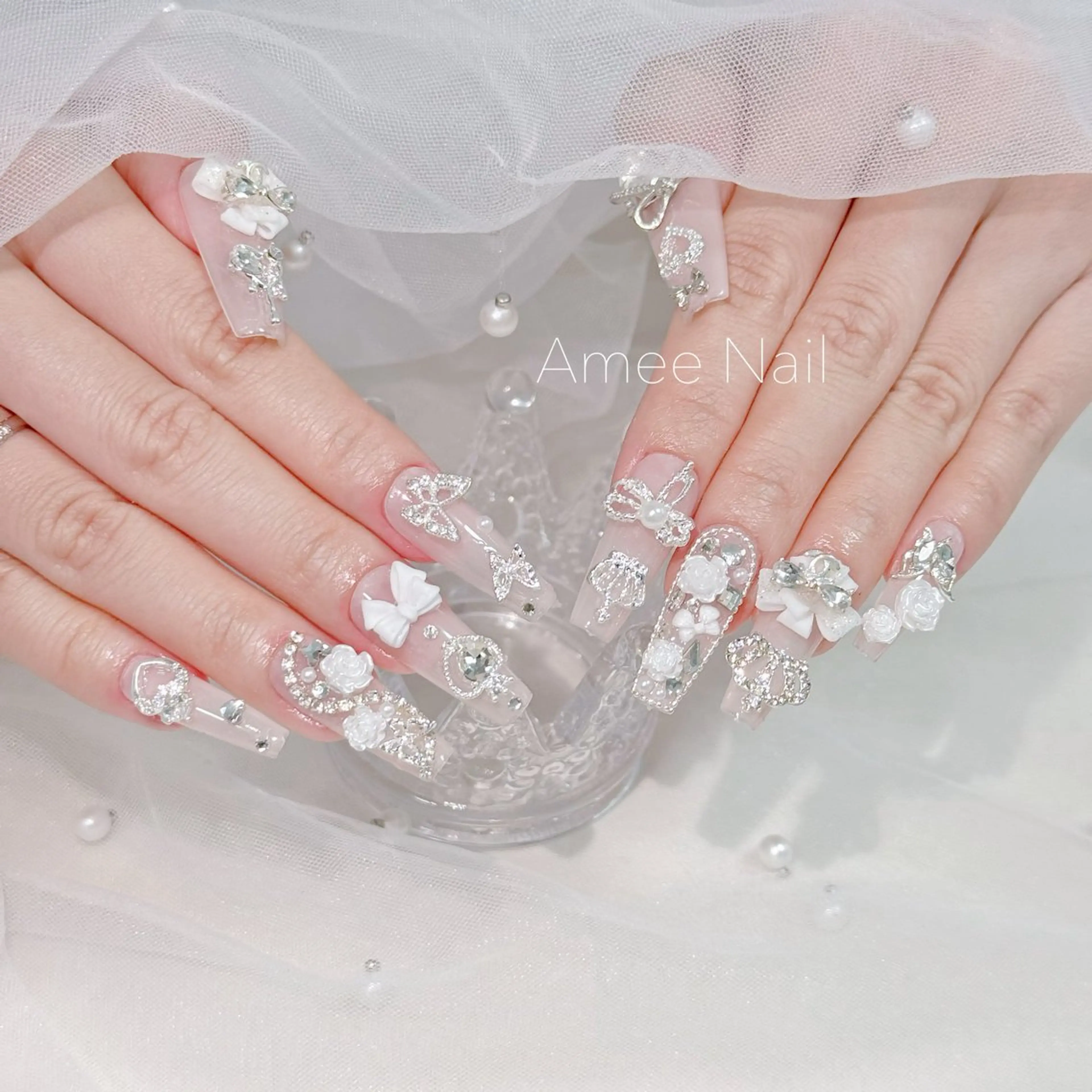ネイル 成人式 ロングネイル マグネットネイル 大理石ネイル(マーブル) リボン ハンドネイル Amee Nail Salonのネイルデザイン