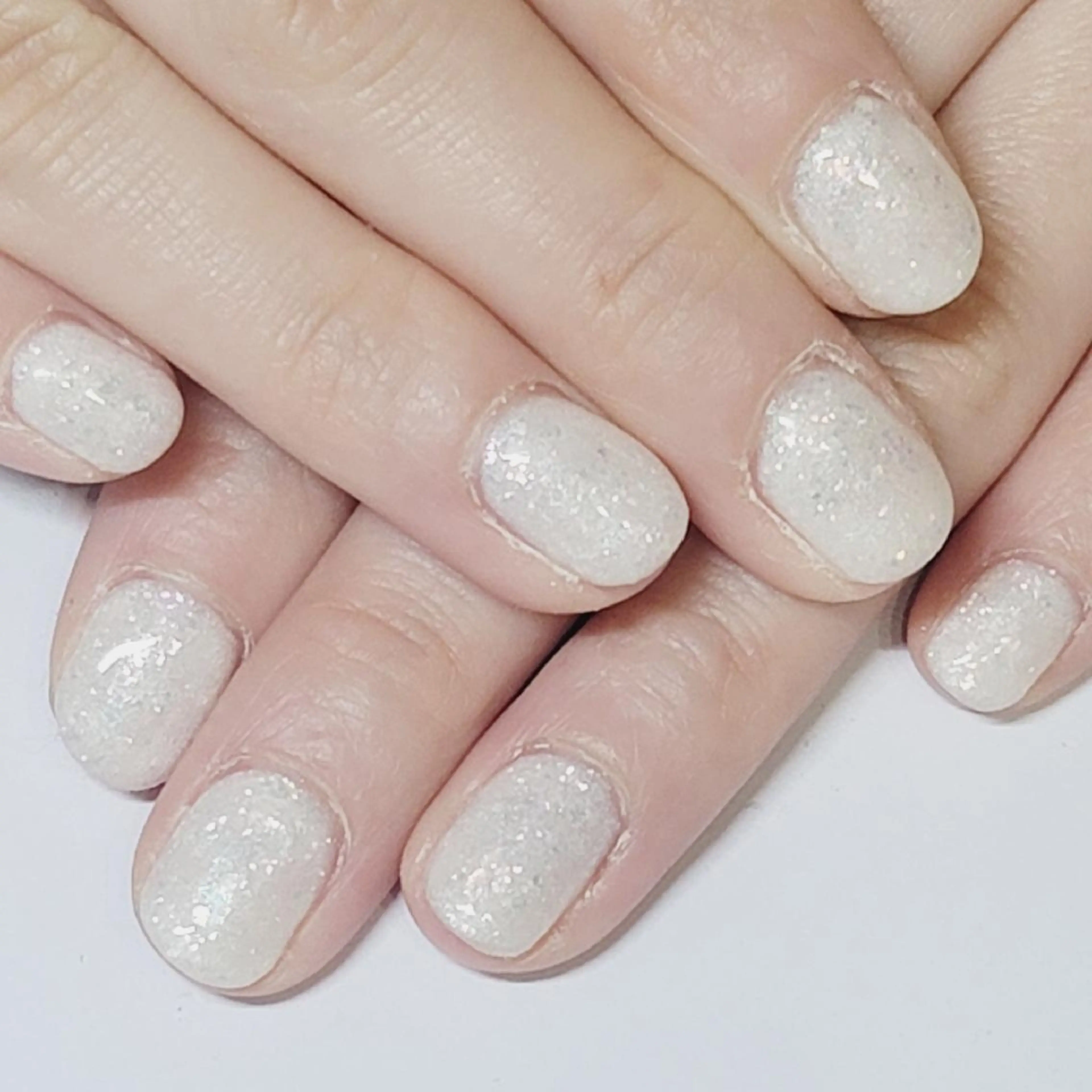 ネイル オーロラネイル ホログラムネイル ワンカラーネイル ホワイト ハンドネイル よしだ ひろきのネイルデザイン