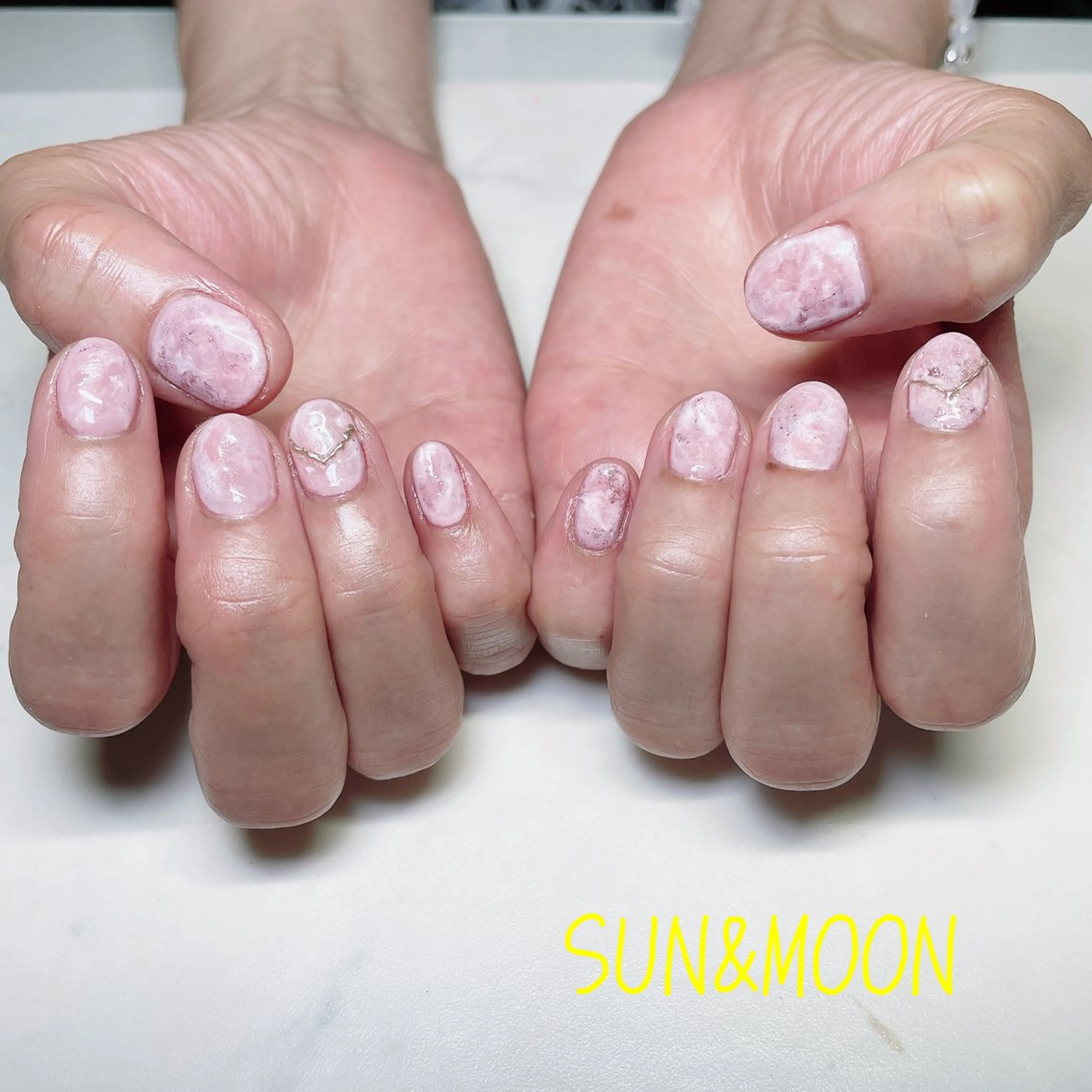 ネイル SUN&MOON REOのネイルデザイン