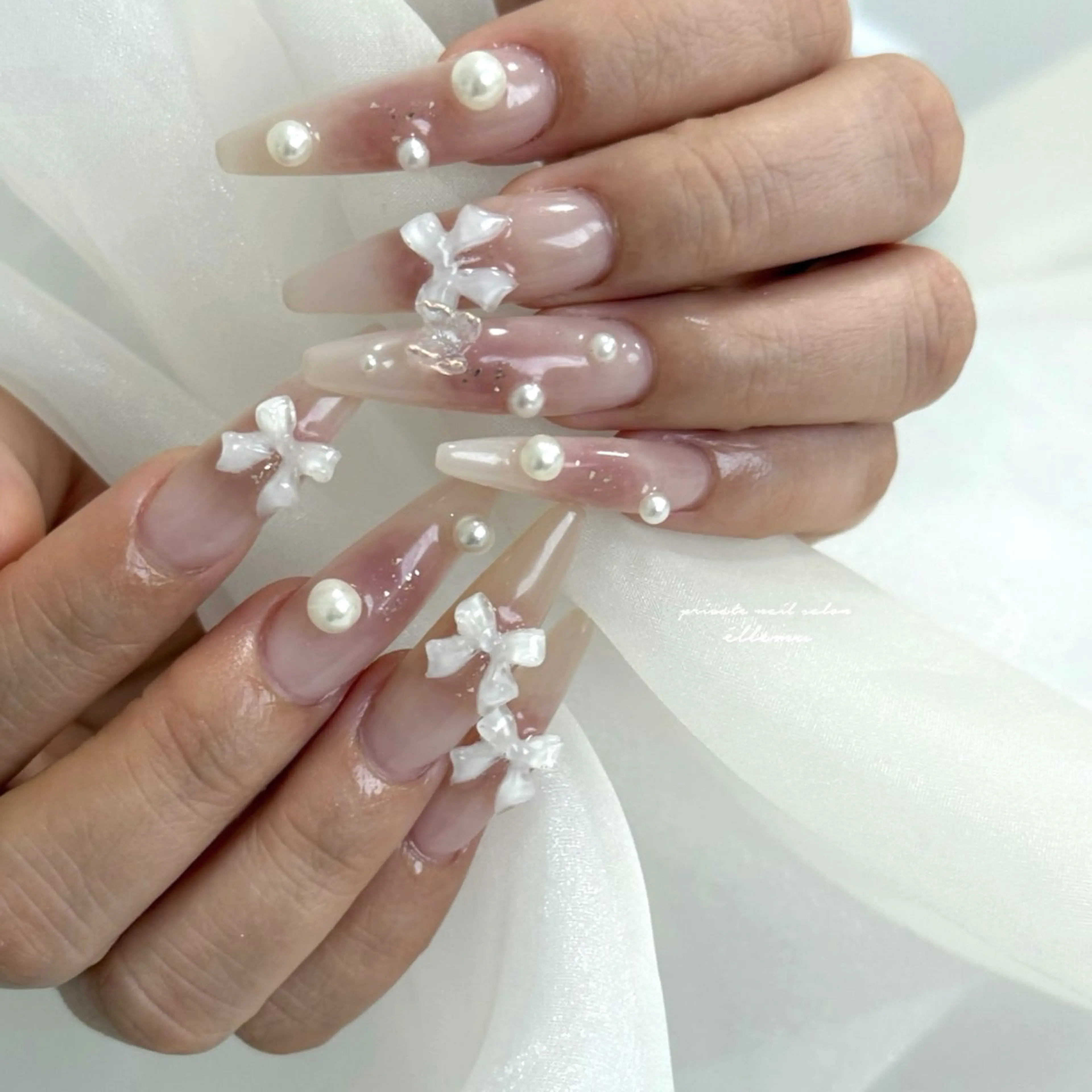 ネイル チークネイル リボン ハンドネイル éllemu えるみゅのネイルデザイン