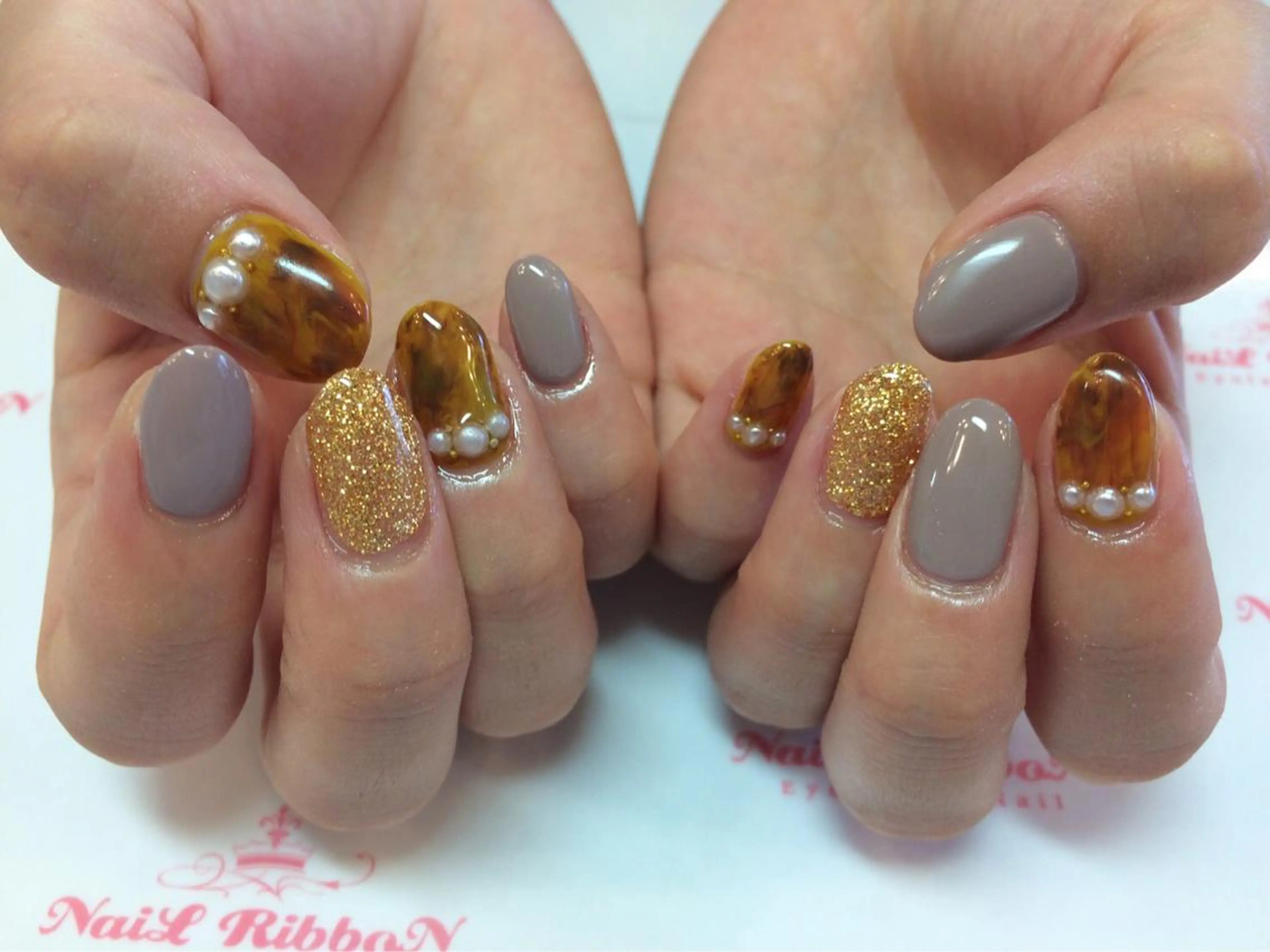 ネイル ネイルリボン 受付スタッフのネイルデザイン