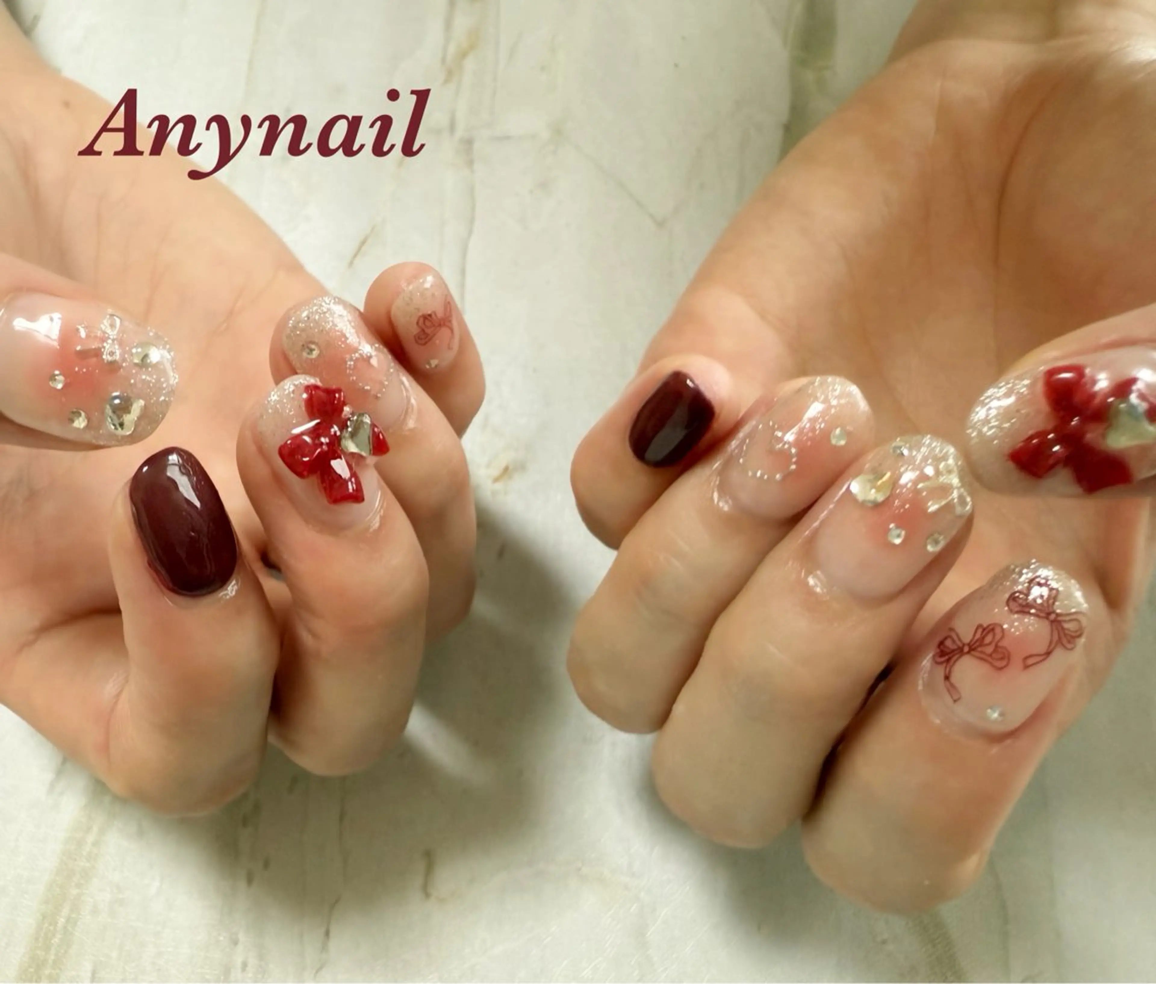 ネイル ブルー ボルドー チークネイル ハート リボン 岩澤 恵子のネイルデザイン