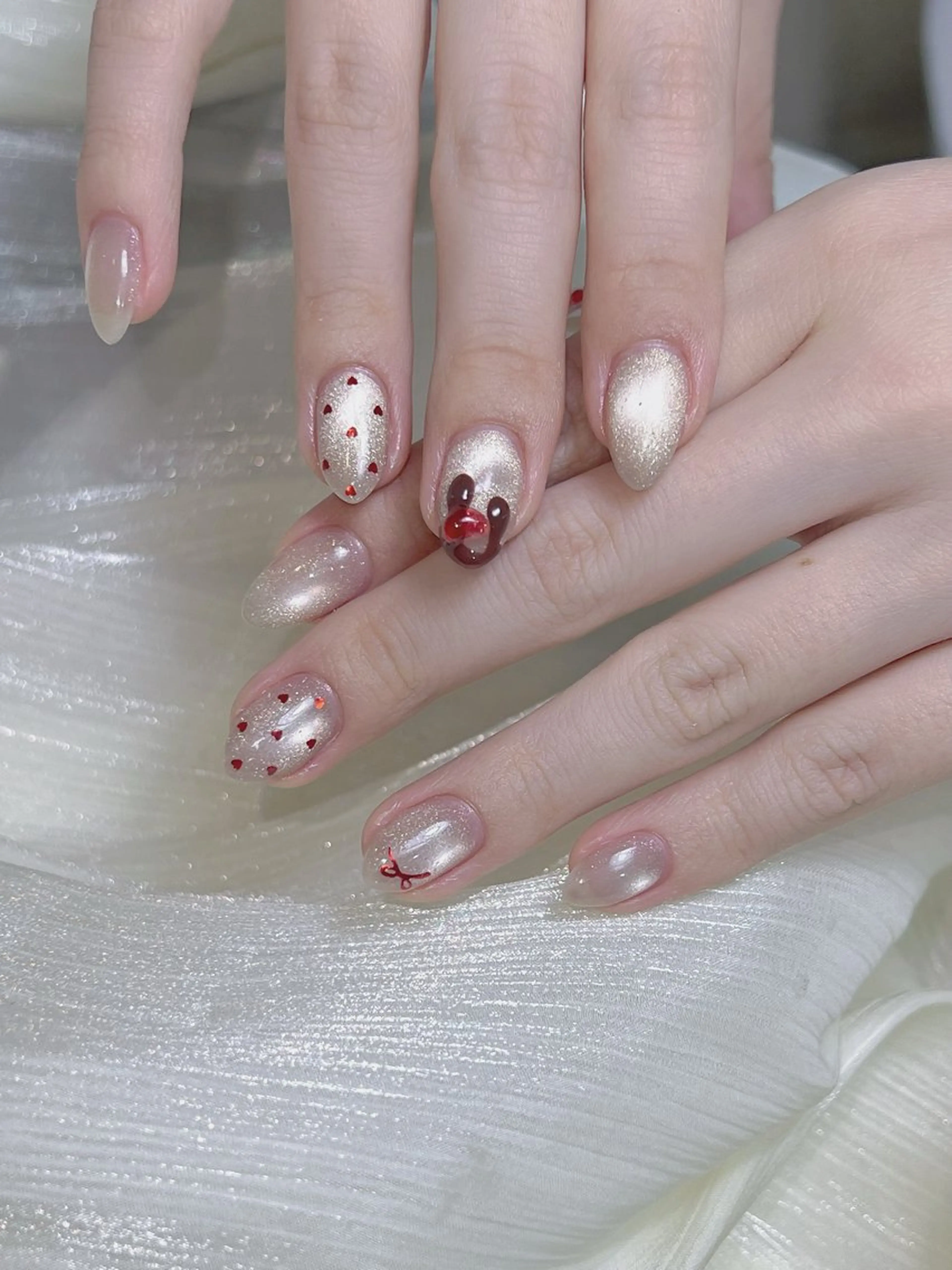 ネイル アートネイル ジェルネイル ガーリー ハート キラキラネイル DOMI　NAIL 💅🏻のネイルデザイン