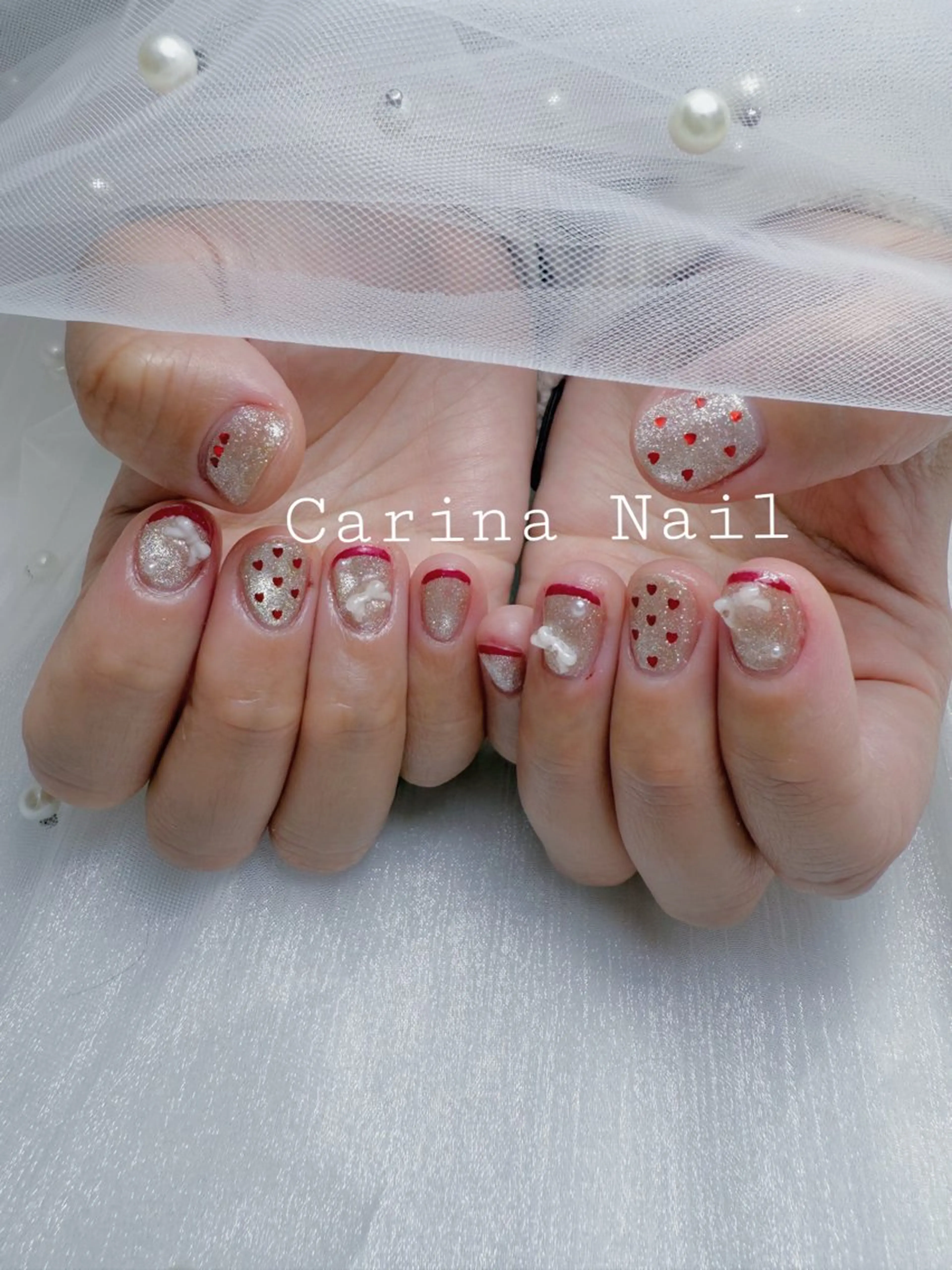 ネイル フレンチネイル ハート 赤色 Carina Nailのネイルデザイン