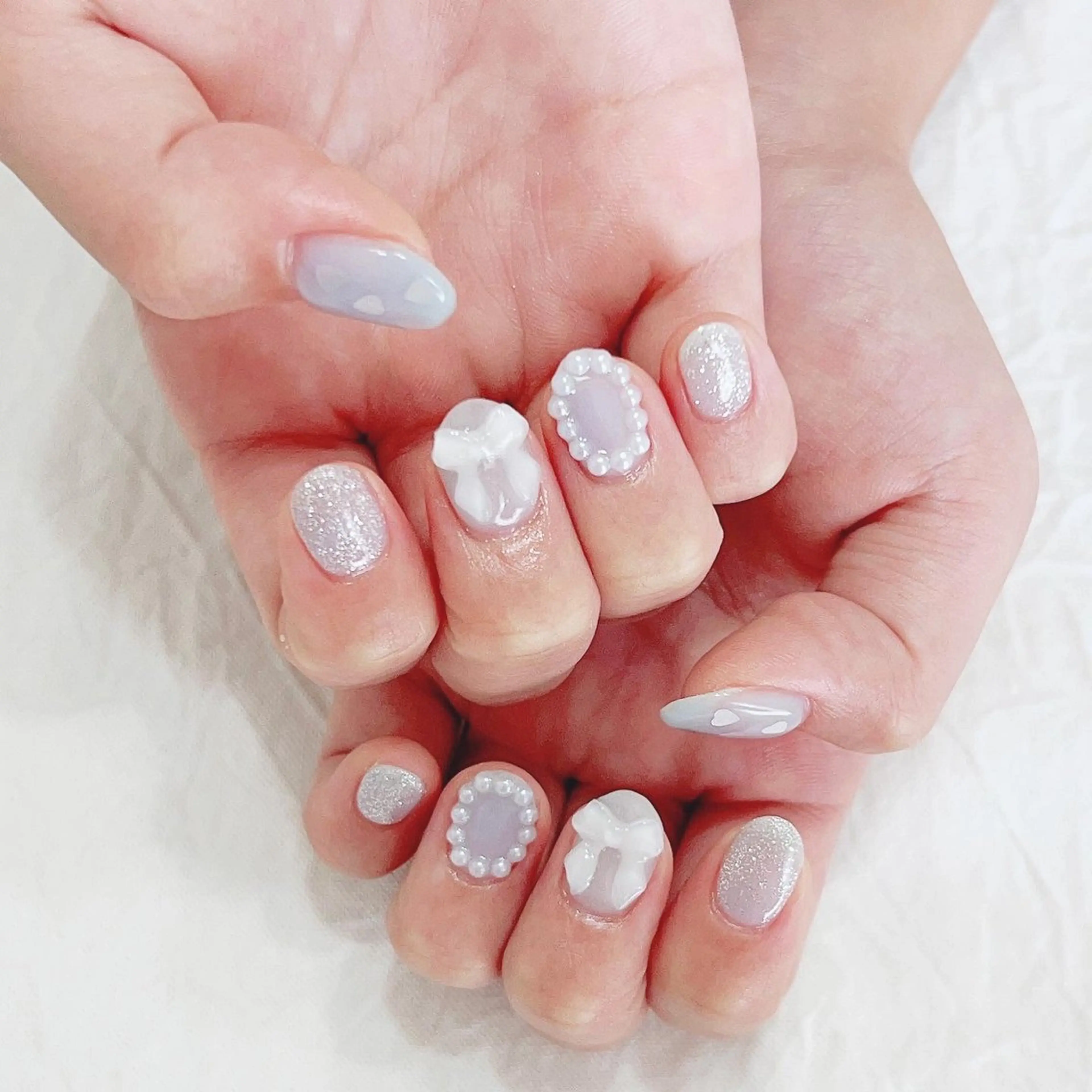 ネイル クリアネイル ハート ラメ(グリッター) 水色 リボン ハンドネイル peaberry nailのネイルデザイン