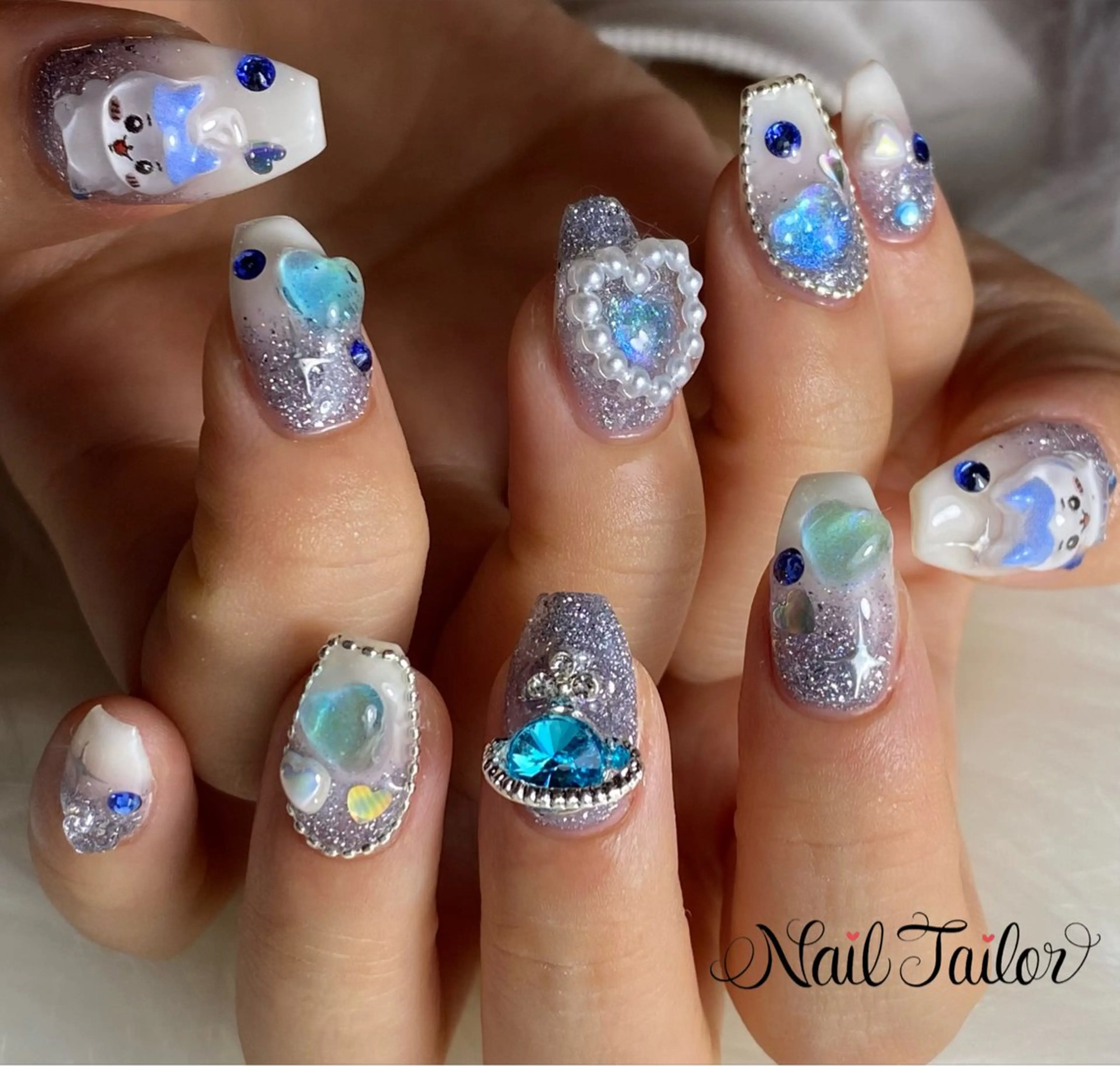 ネイル 長さ出し ハート ラメ(グリッター) 水色 ハンドネイル 〜Nail Tailor〜 ネイルテイラー所属・NailTailor ネイルテイラーのネイルデザイン