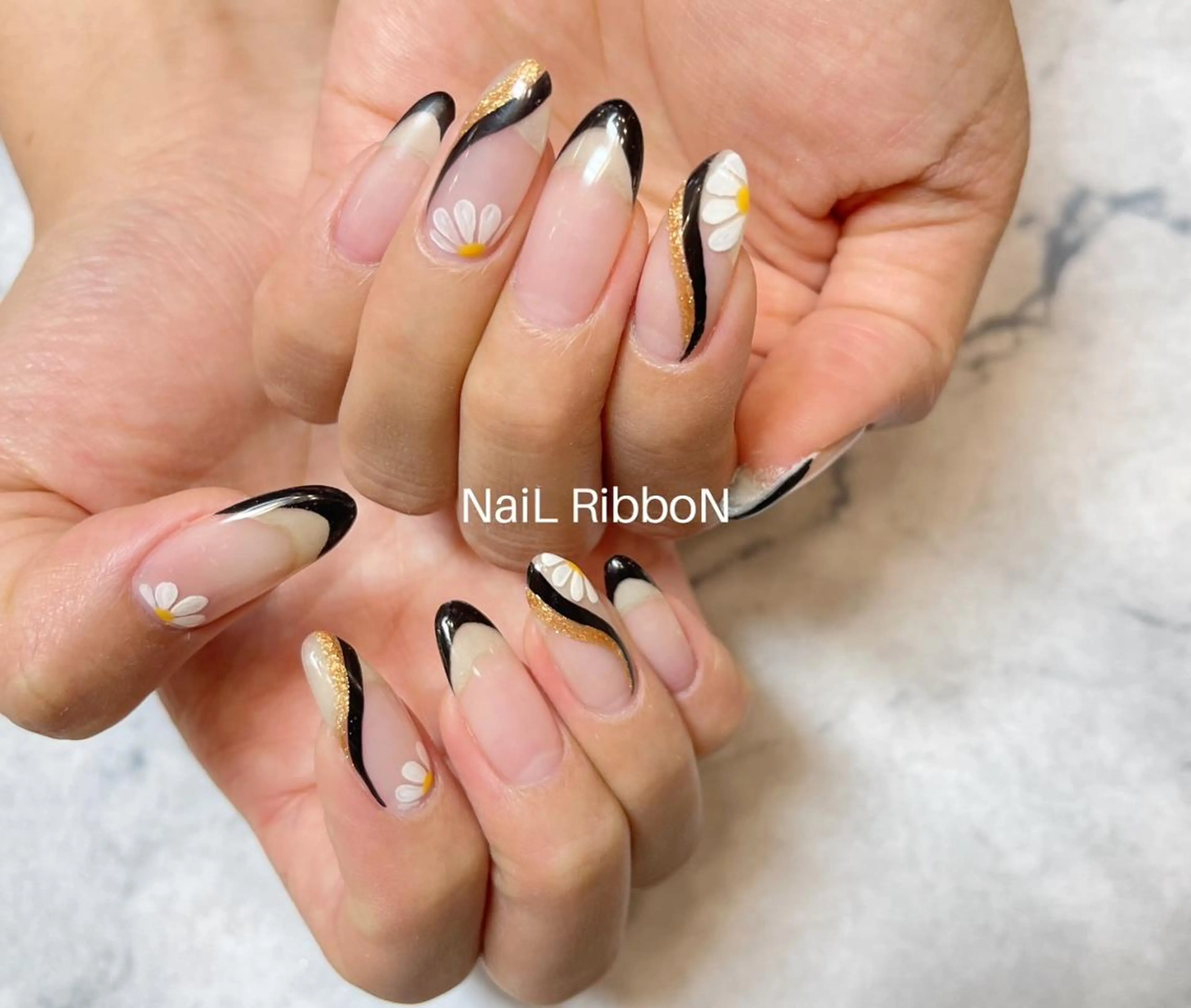 ネイル ネイルリボン 受付スタッフのネイルデザイン