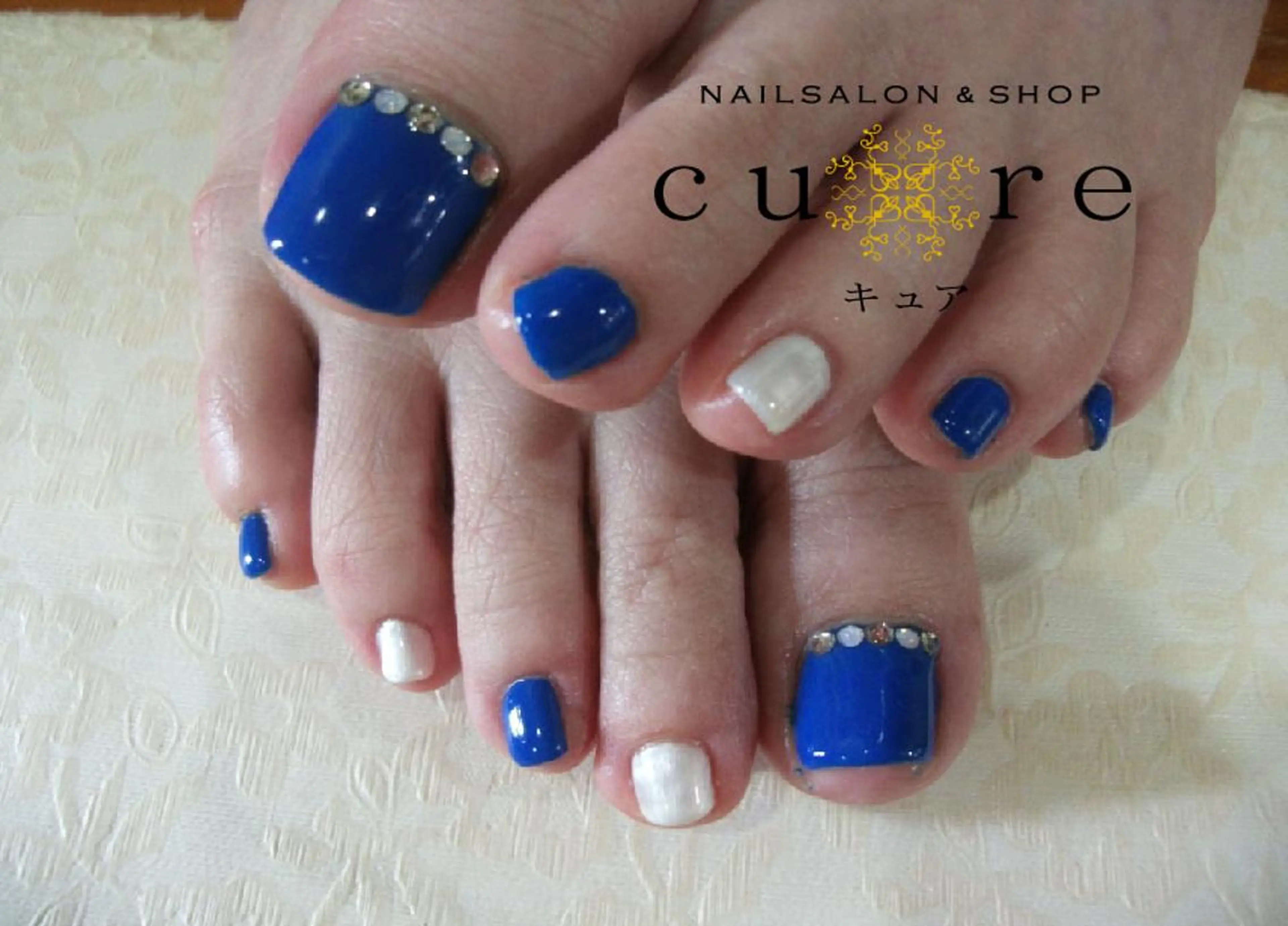 ネイル フットネイル ジェルネイル ホワイト ネイルサロン Cureのネイルデザイン