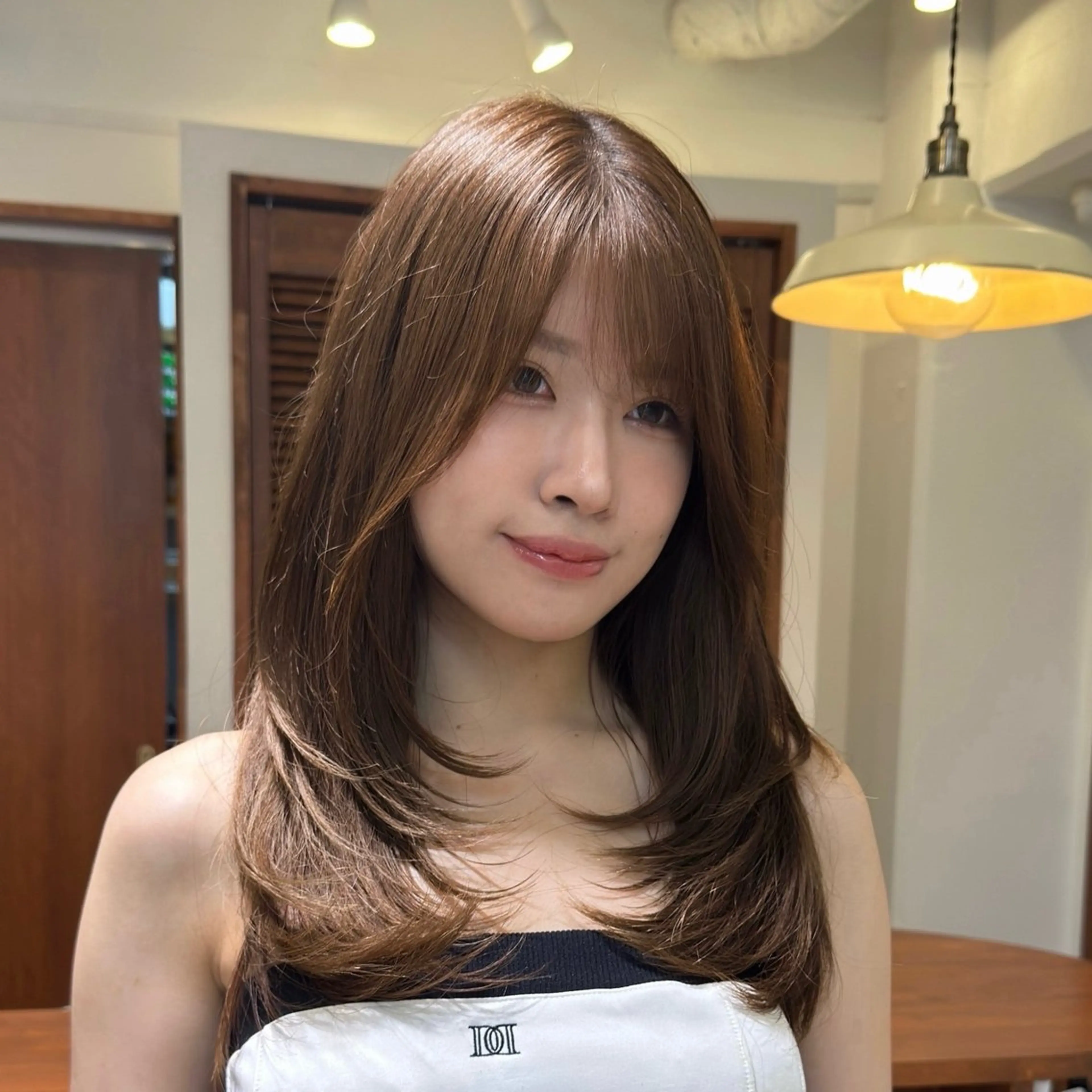 小顔見え◎レイヤーカット＋髪質改善トリートメントの写真