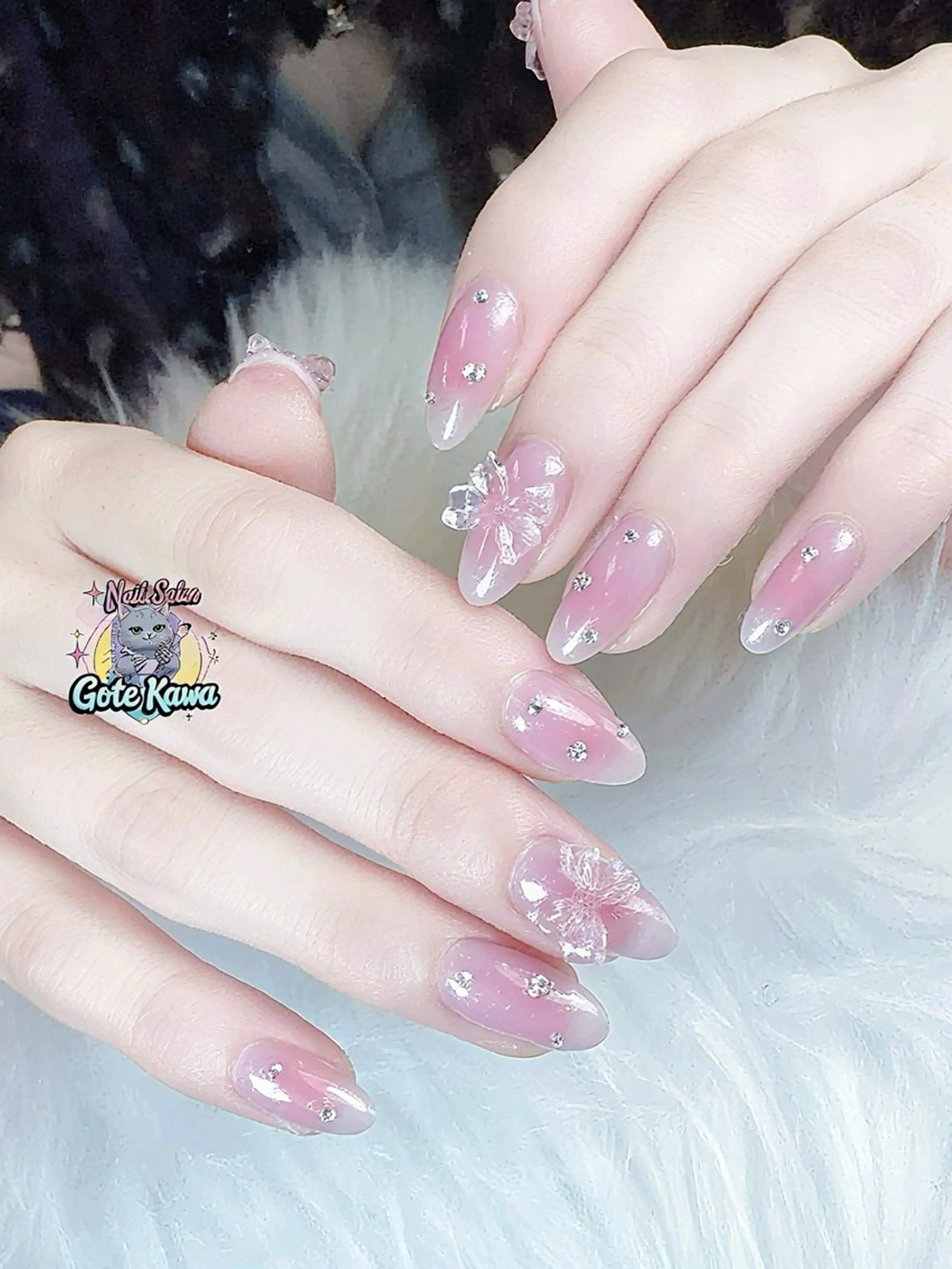 ネイル アートネイル 長さ出し キラキラネイル ピンク リボン ハンドネイル ハンドケア Gote Kawa nail salonのネイルデザイン