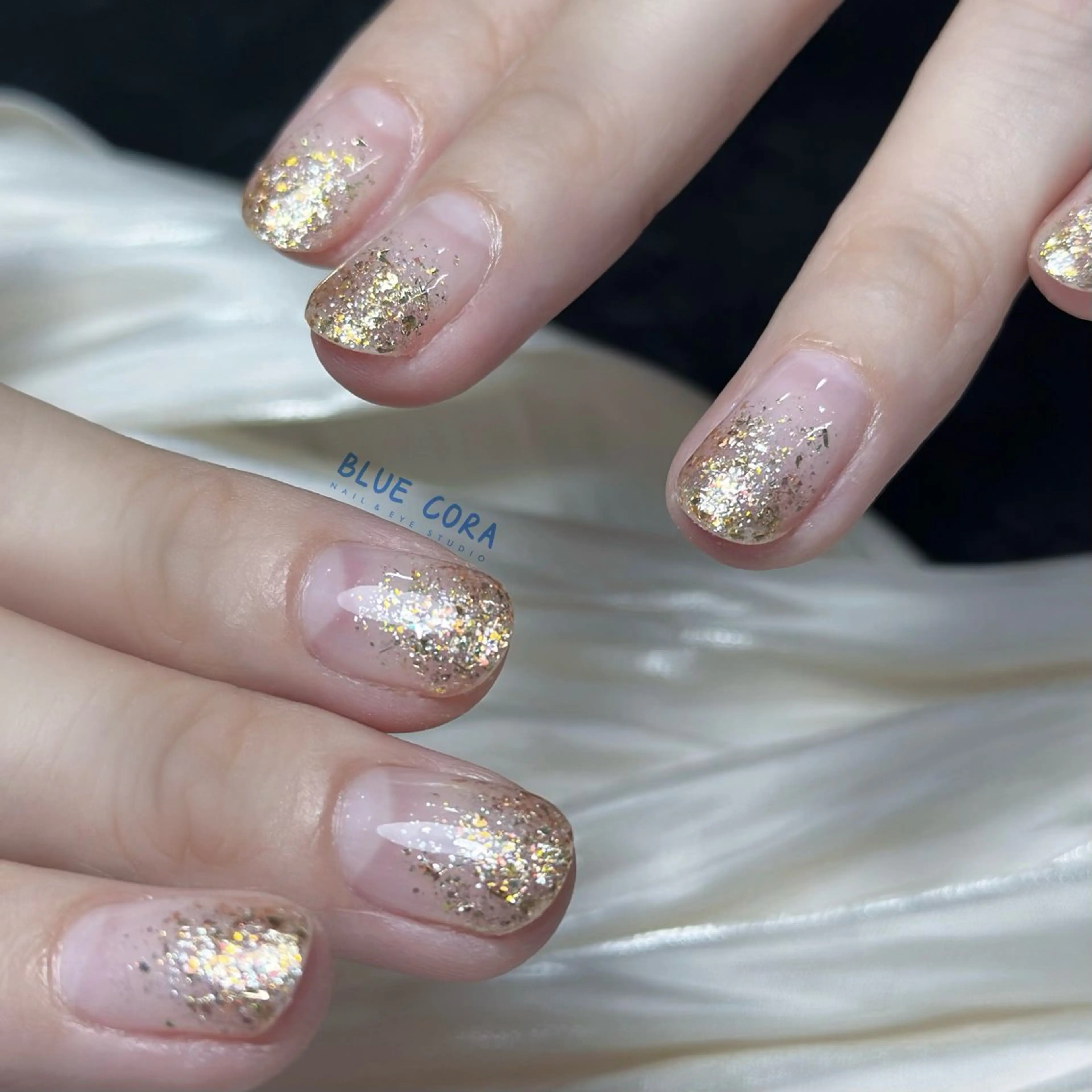 ネイル グラデーション ラメ(グリッター) ラメグラデーション ハンドネイル ハンドケア BLUE CORAのネイルデザイン