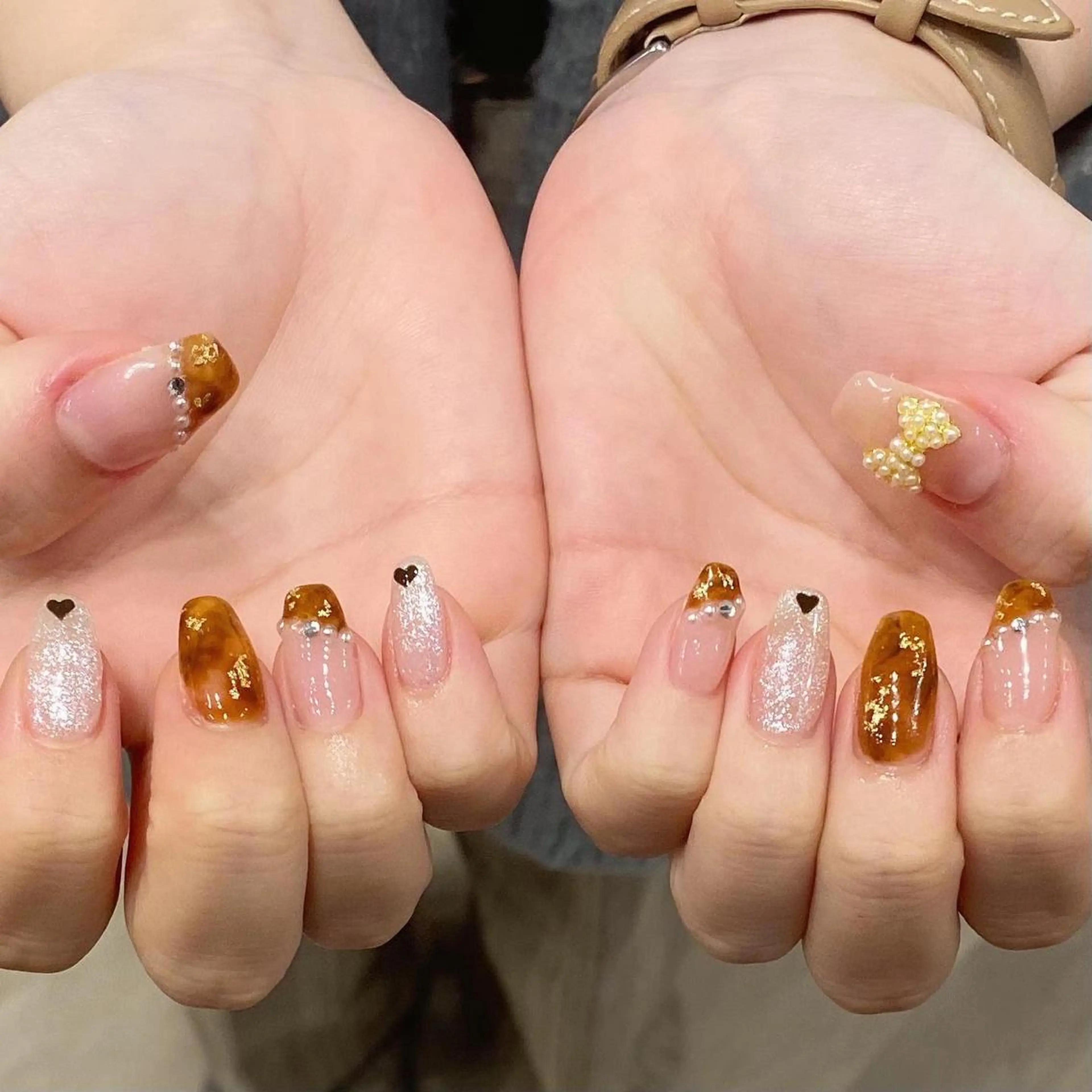 ネイル べっ甲ネイル フットネイル 韓国ネイル リボン ワンホンネイル ハンドネイル melumooi nailのネイルデザイン