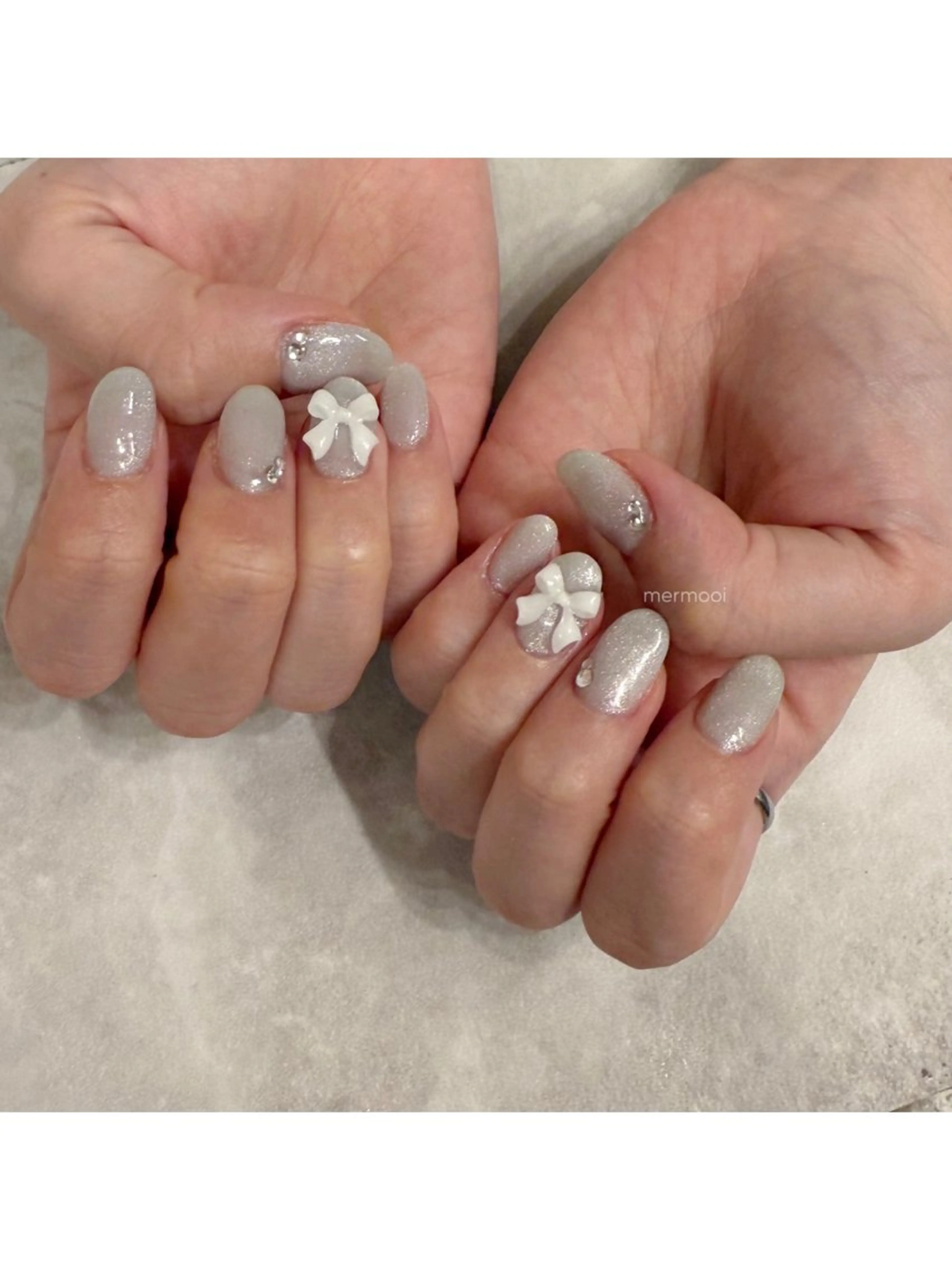 ネイル 韓国ネイル マグネットネイル リボン melumooi nailのネイルデザイン