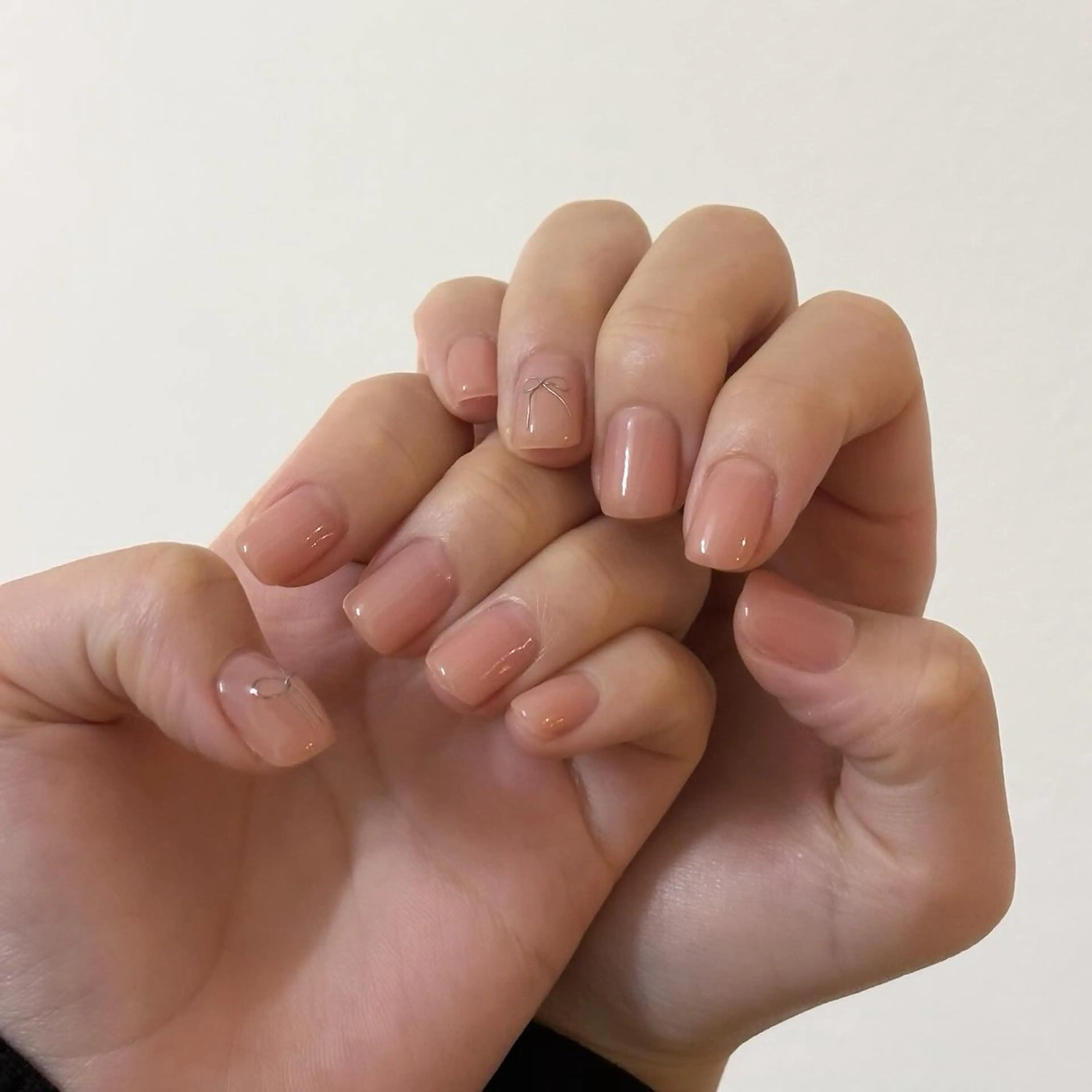 ネイル 韓国ネイル ピンク リボン Elio所属・Elio 国泰寺のネイルデザイン