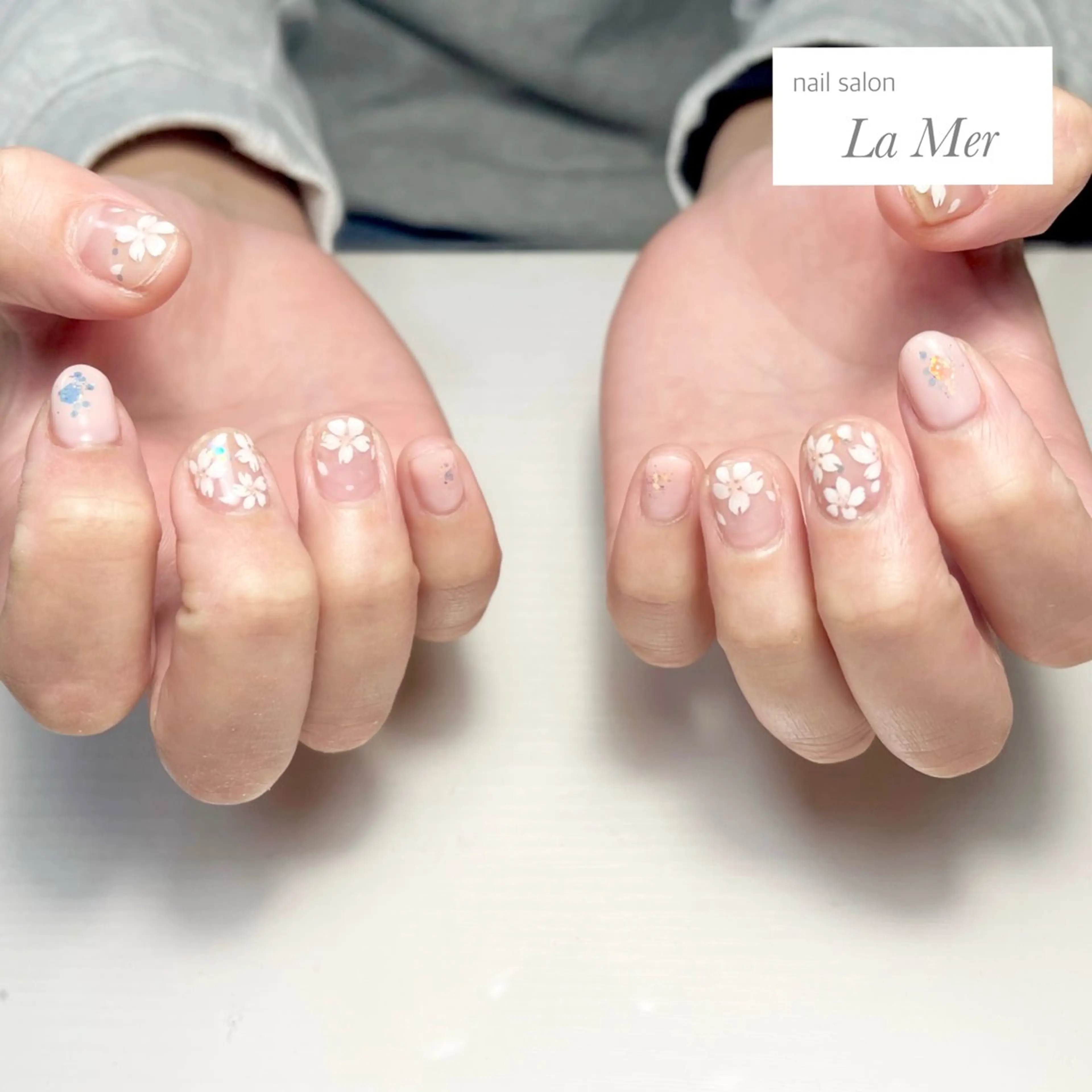 ネイル オーロラネイル 桜ネイル フラワーネイル オフィスネイル ピンク ハンドネイル nailsalon La Merのネイルデザイン