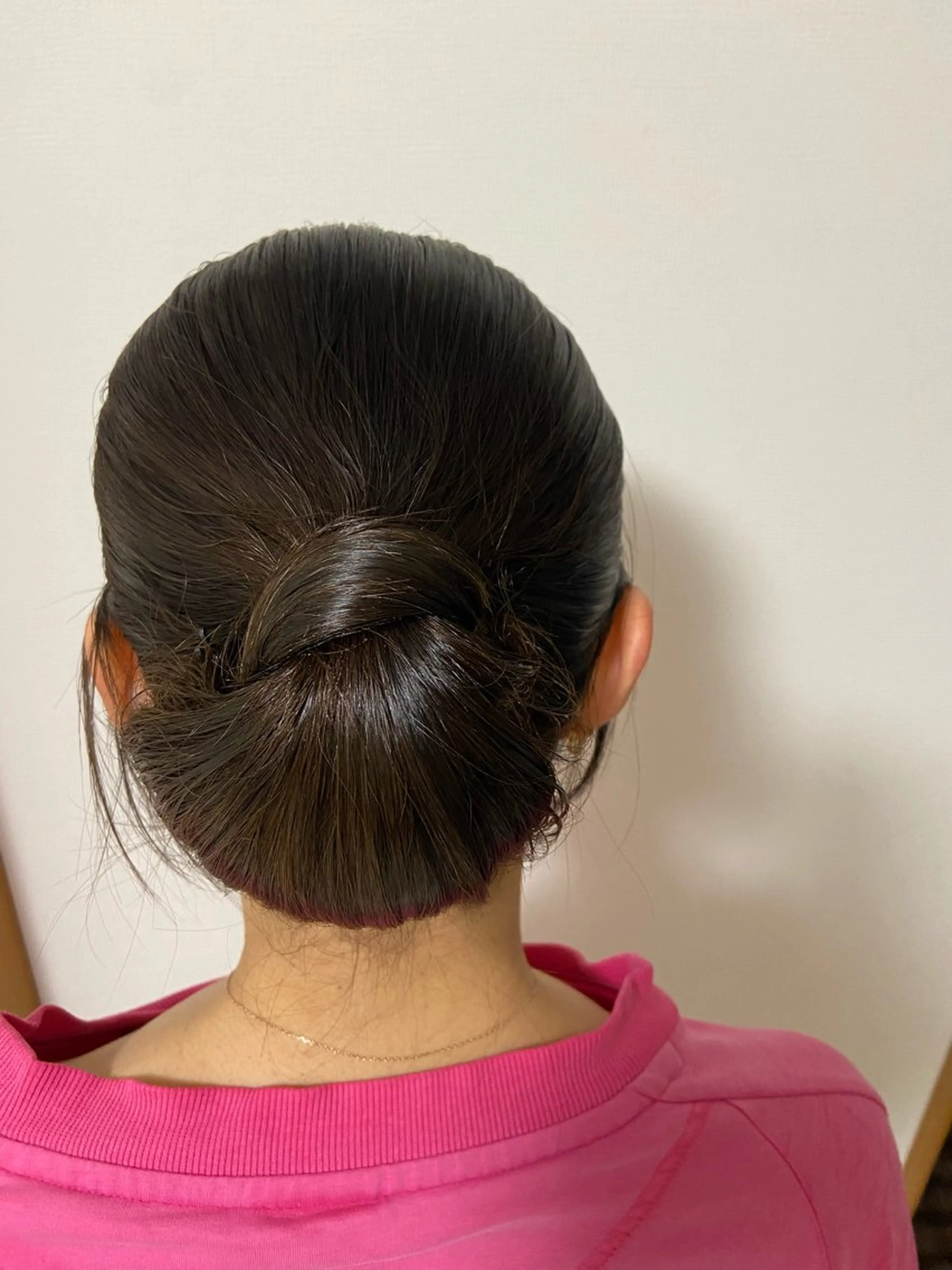 ⭐️タイトシニヨン　モデル様の写真