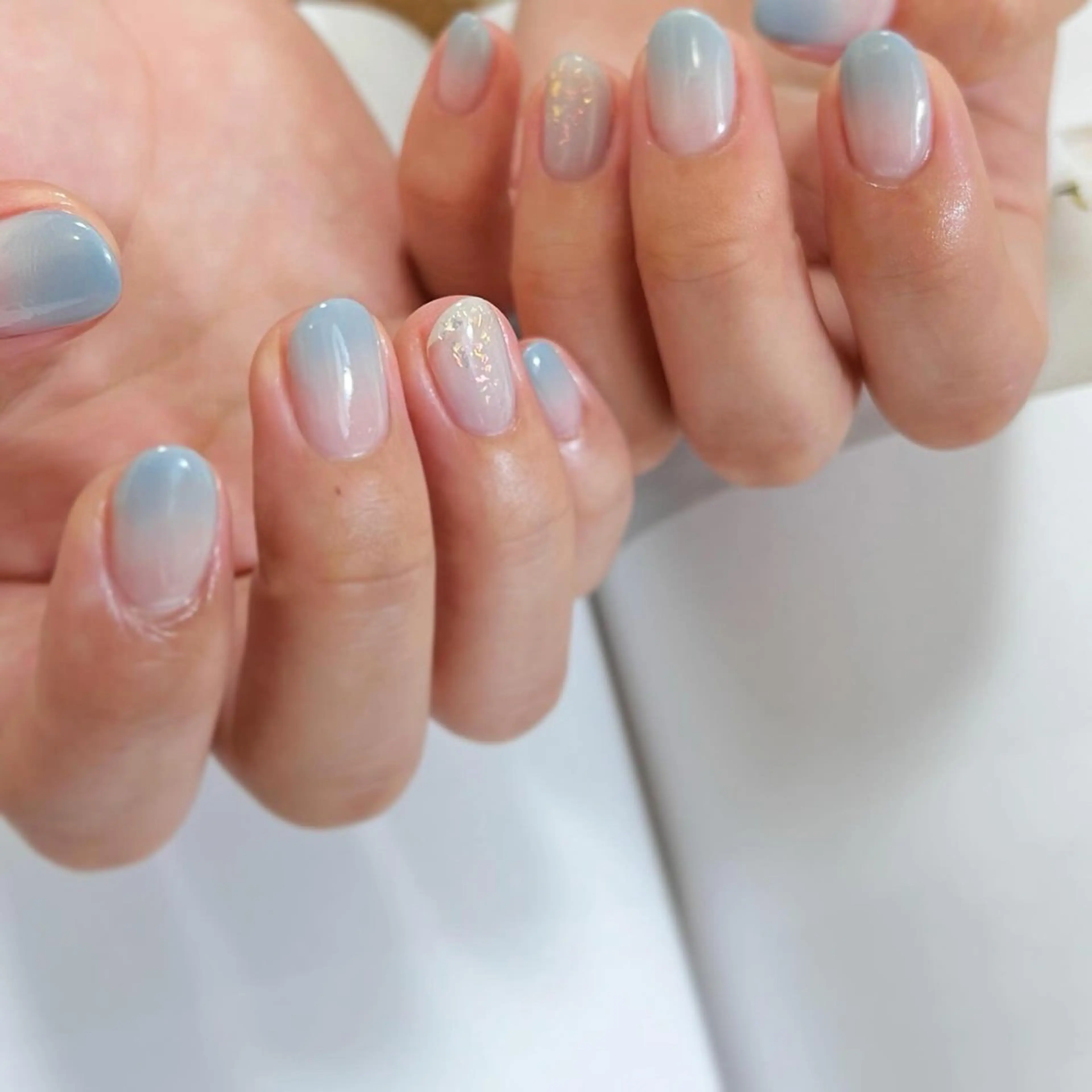 ネイル オーロラネイル ブルー グラデーション シンプルネイル 冬ネイル ハンドネイル pointillé .ayaのネイルデザイン